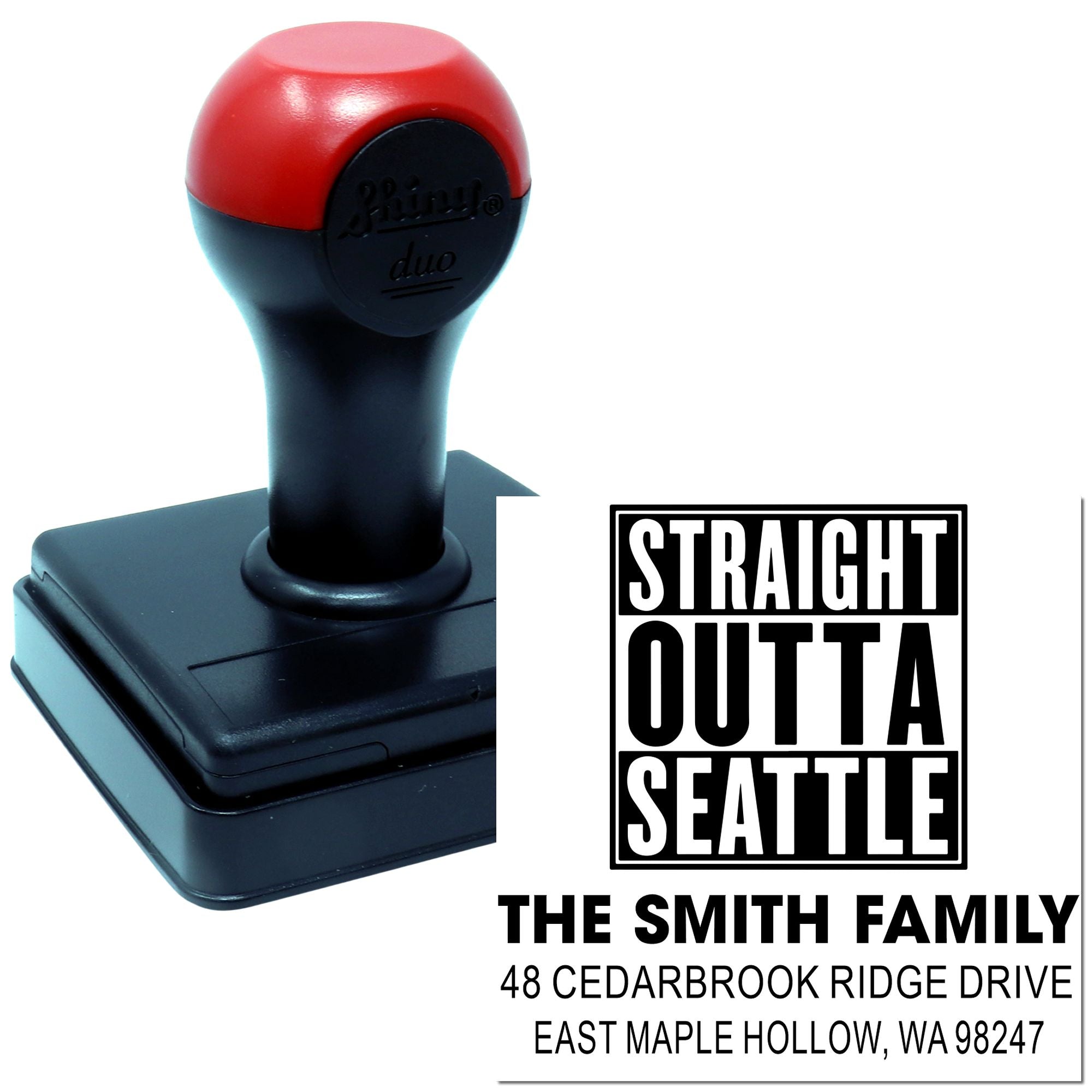 Custom self-inking address stamp with red and black handle, showing Straight Outta Seattle design and Smith family address on a white background.