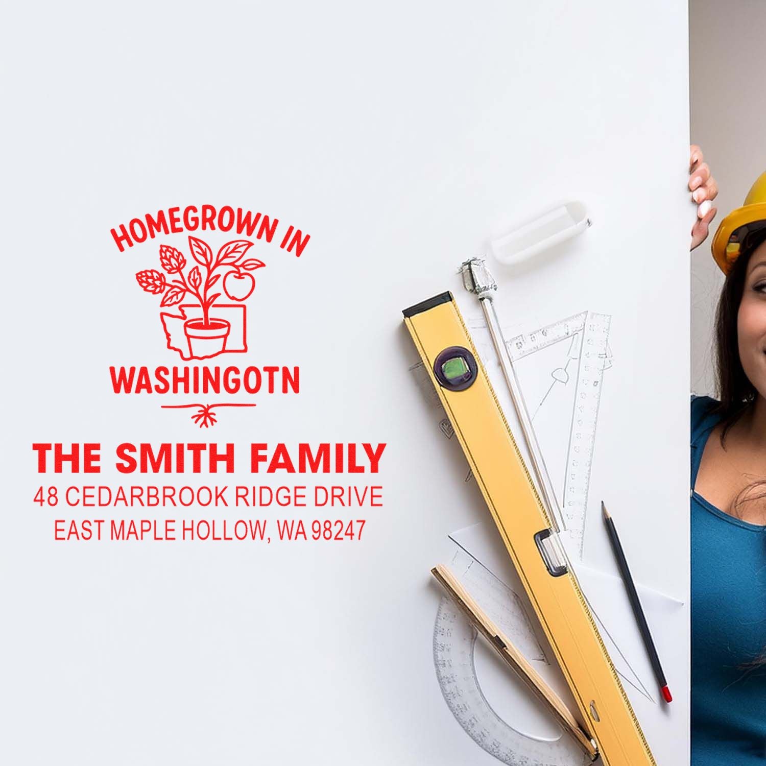 Custom homegrown in Washington address stamp for The Smith Family, displayed on a white surface with drafting tools and level.