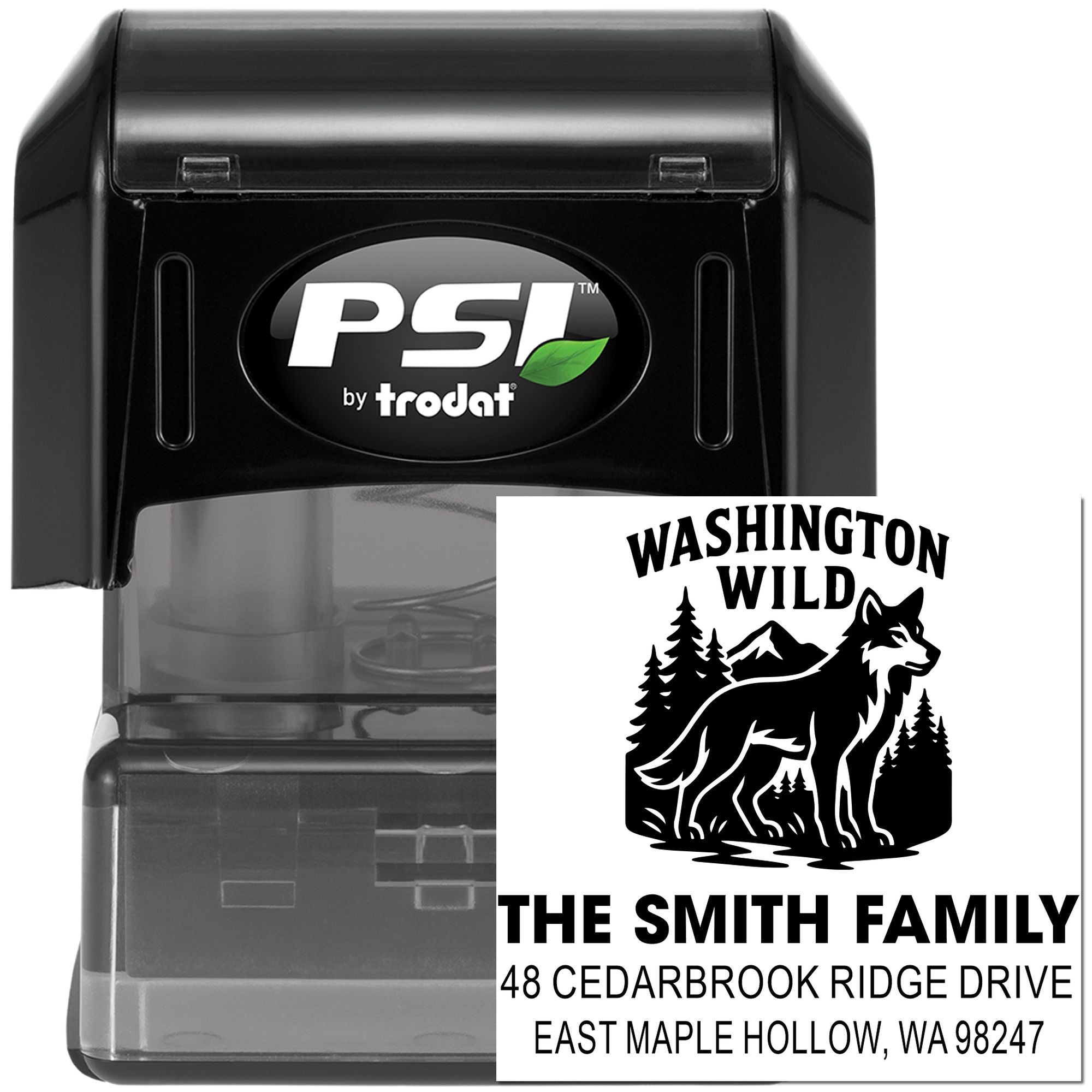 PSI by Trodat custom address stamp with Washington Wild wolf design and family name, shown on a black self-inking stamp case.