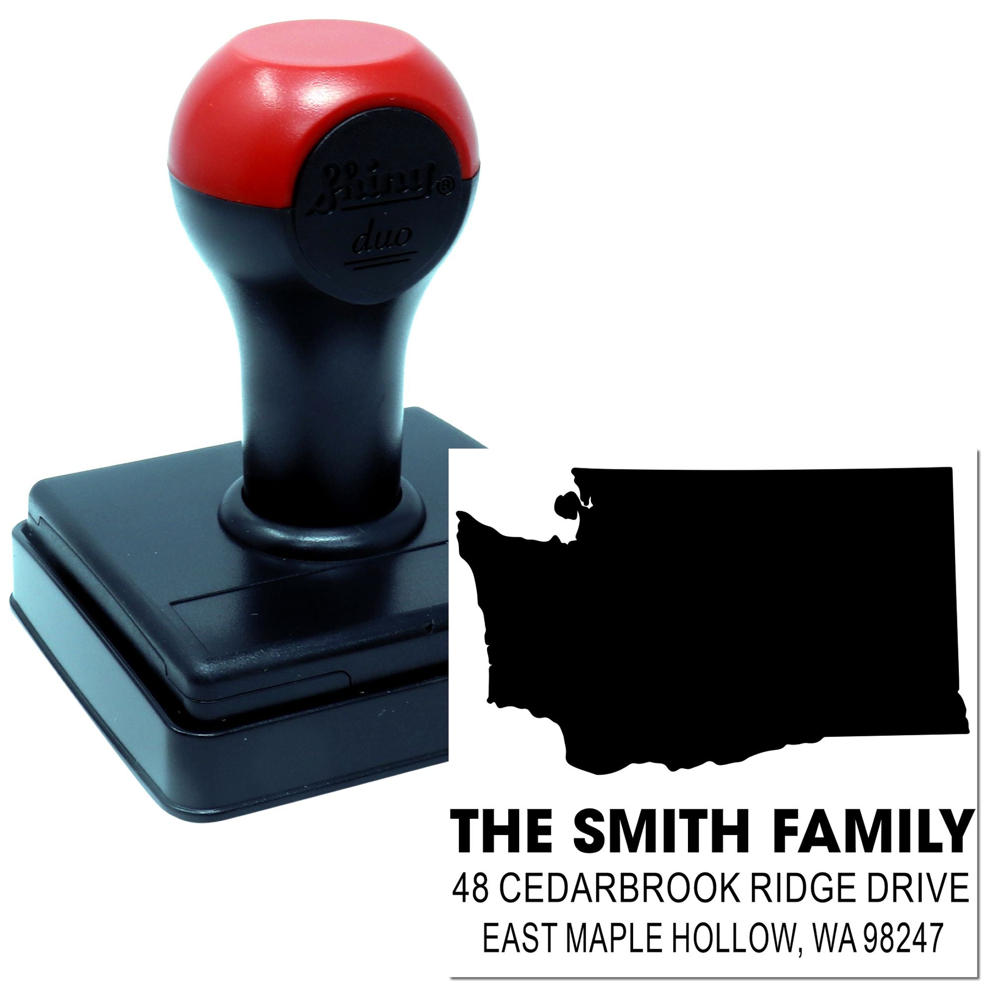 Custom self-inking address stamp with red-and-black handle and imprint for The Smith Family, 48 Cedarbrook Ridge Drive, East Maple Hollow, WA 98247.