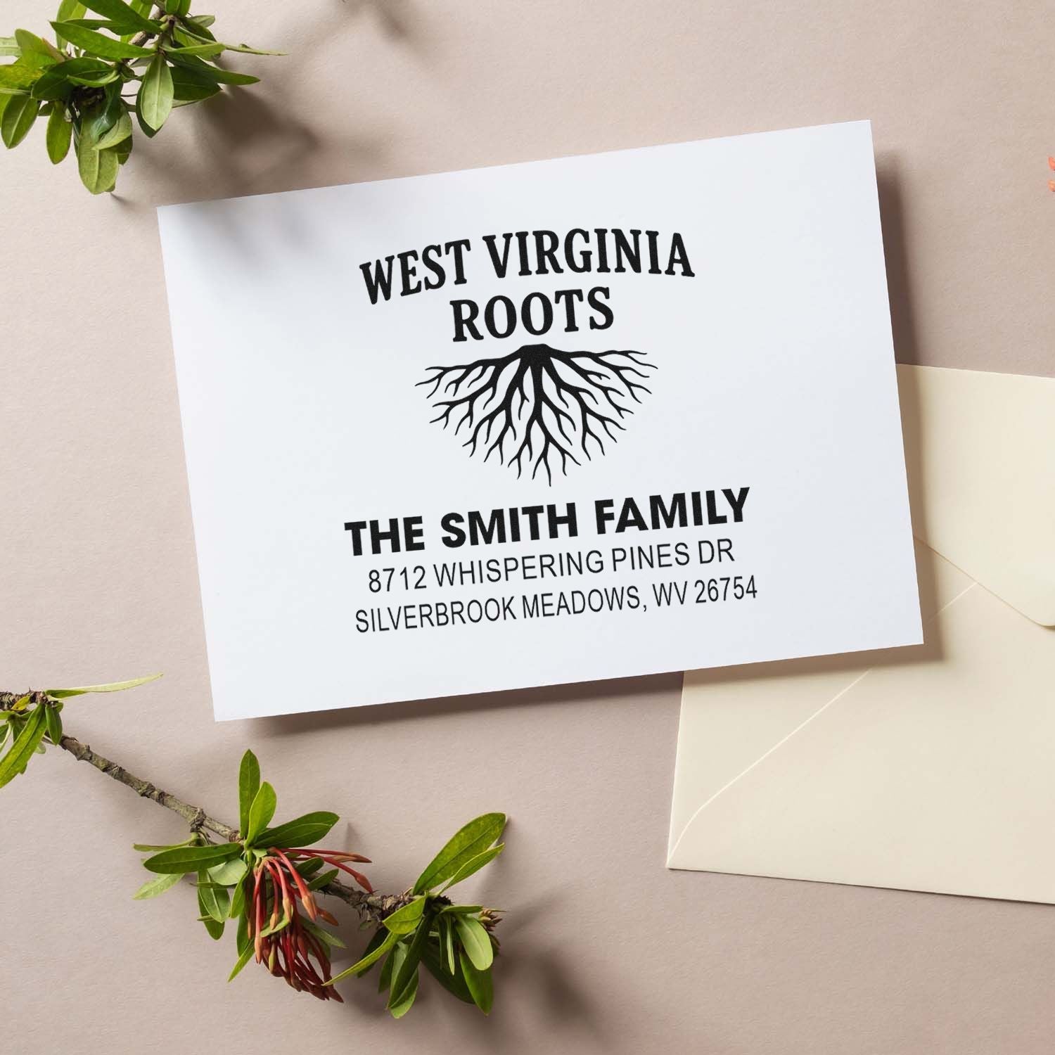 Custom West Virginia Roots family address stamp for The Smith Family, shown on a white card with envelope and greenery.