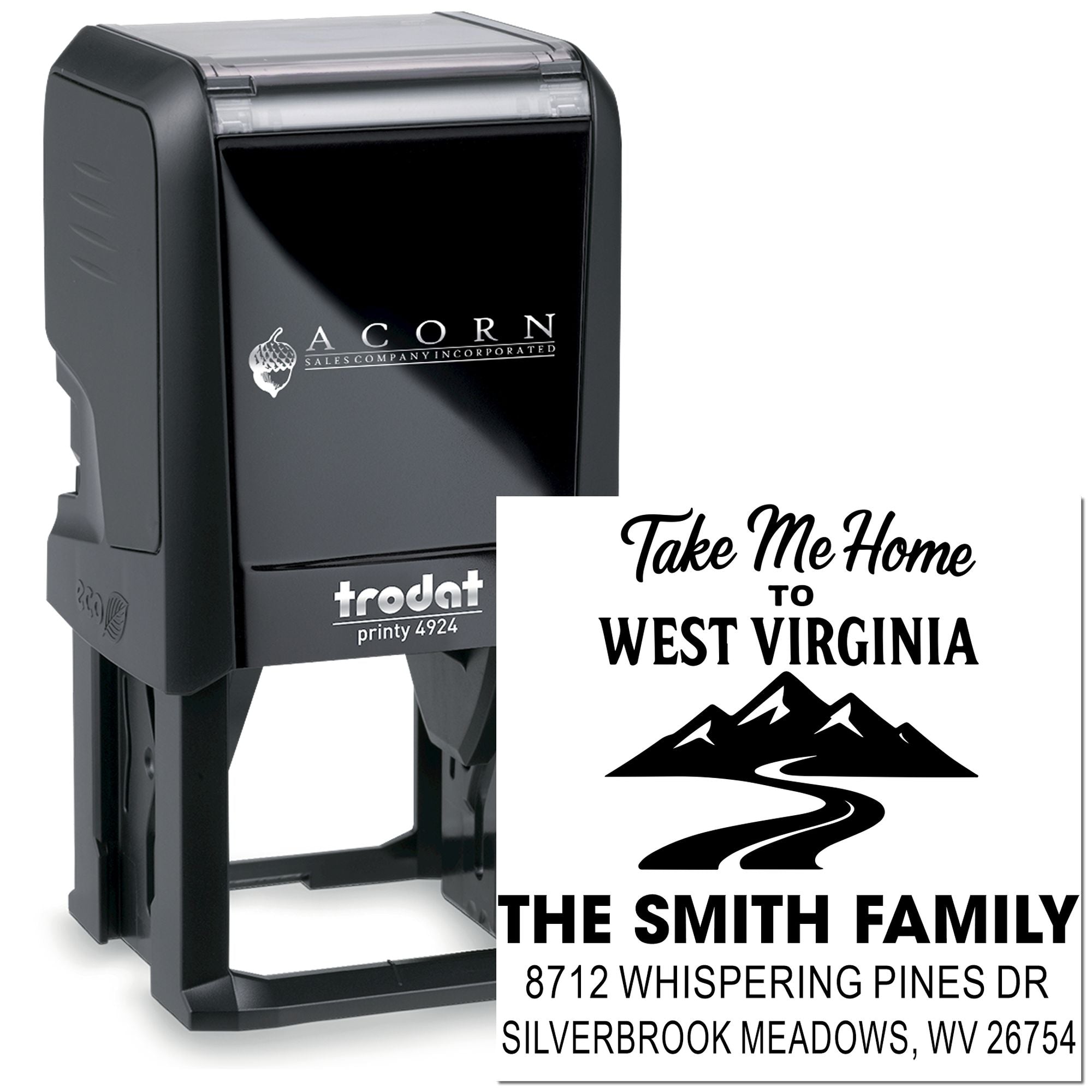 Custom self-inking address stamp with West Virginia design and family name, shown beside a black Trodat stamp case on a white background.