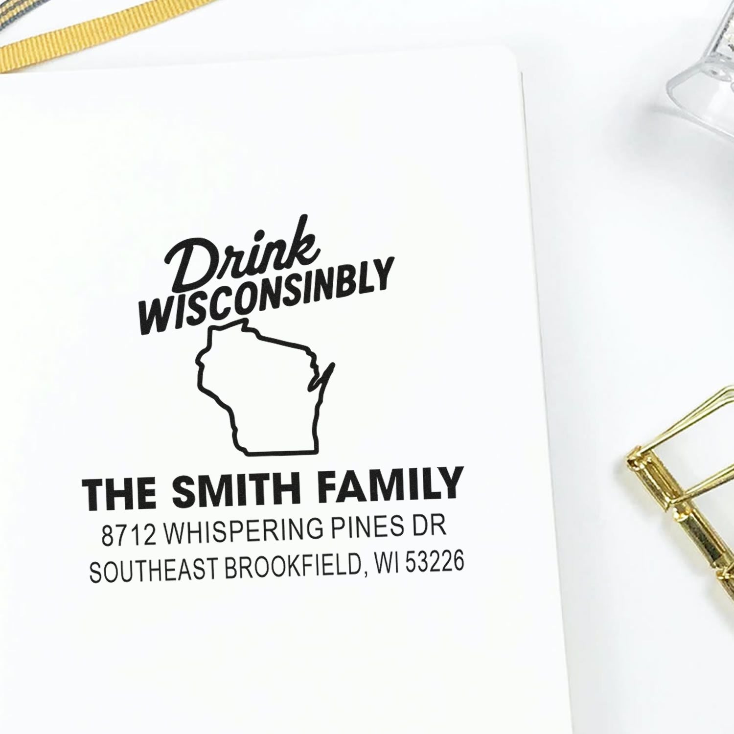 Personalized Wisconsin address stamp with Drink Wisconsibly design, Smith family name, and Brookfield, WI return address on white paper