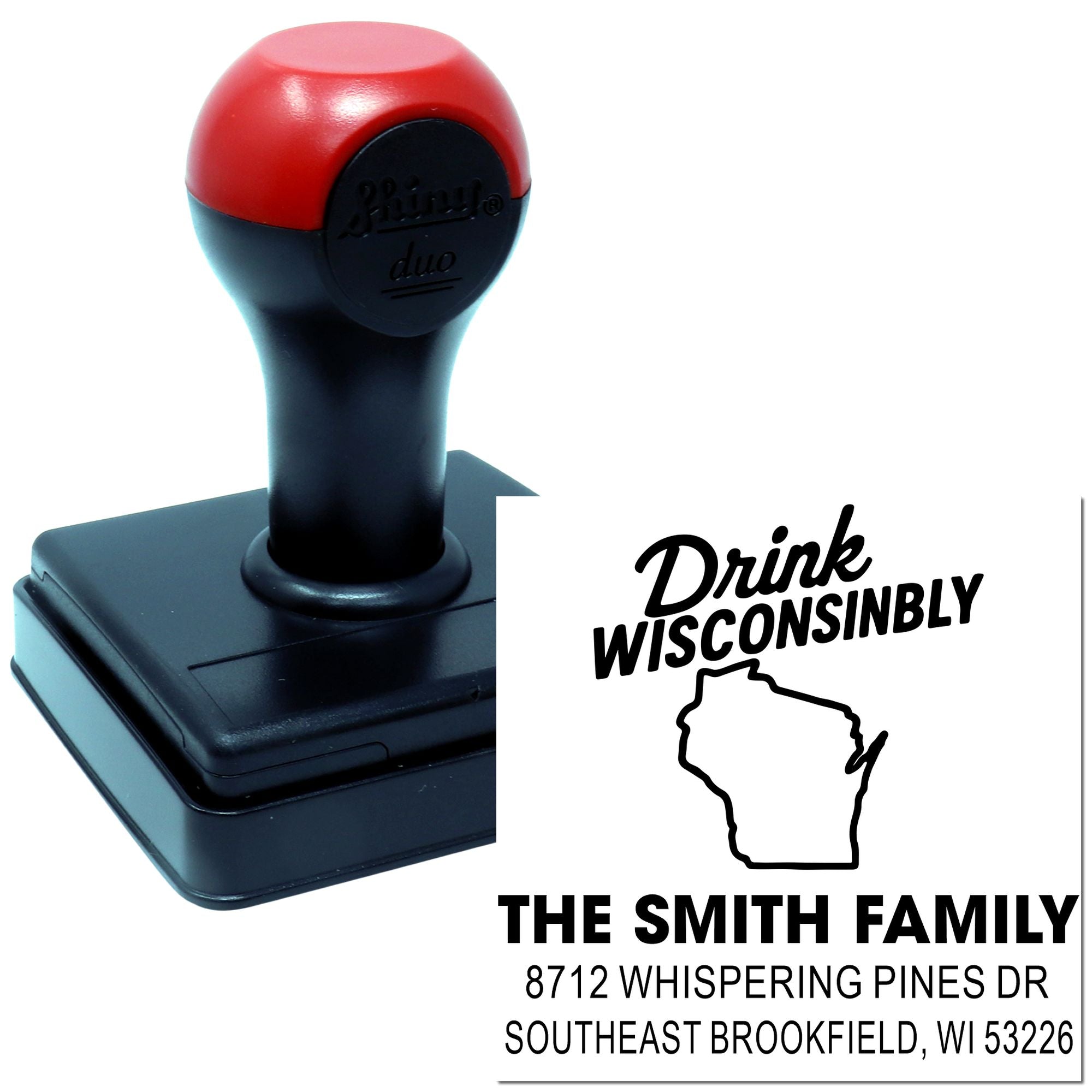 Custom self-inking stamp with red and black handle, featuring Drink Wisconsinbly logo, Wisconsin outline, and The Smith Family address on a white background.