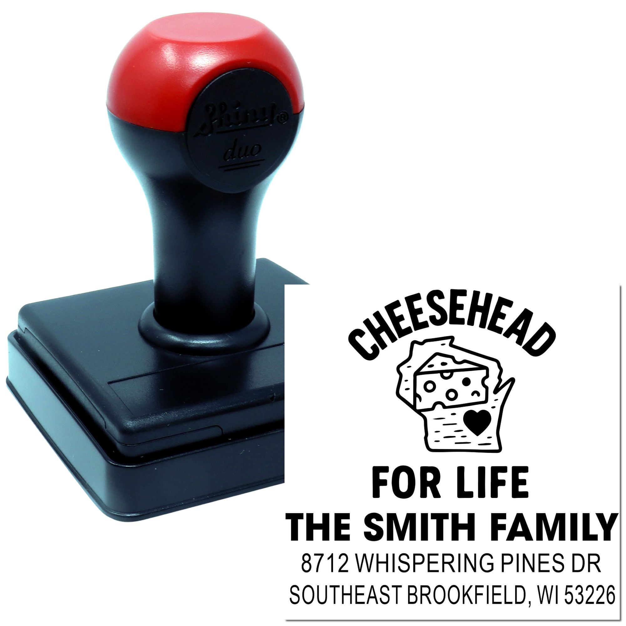 Self-inking custom stamp with red and black handle beside a sample imprint reading Cheesehead for Life for the Smith family address.