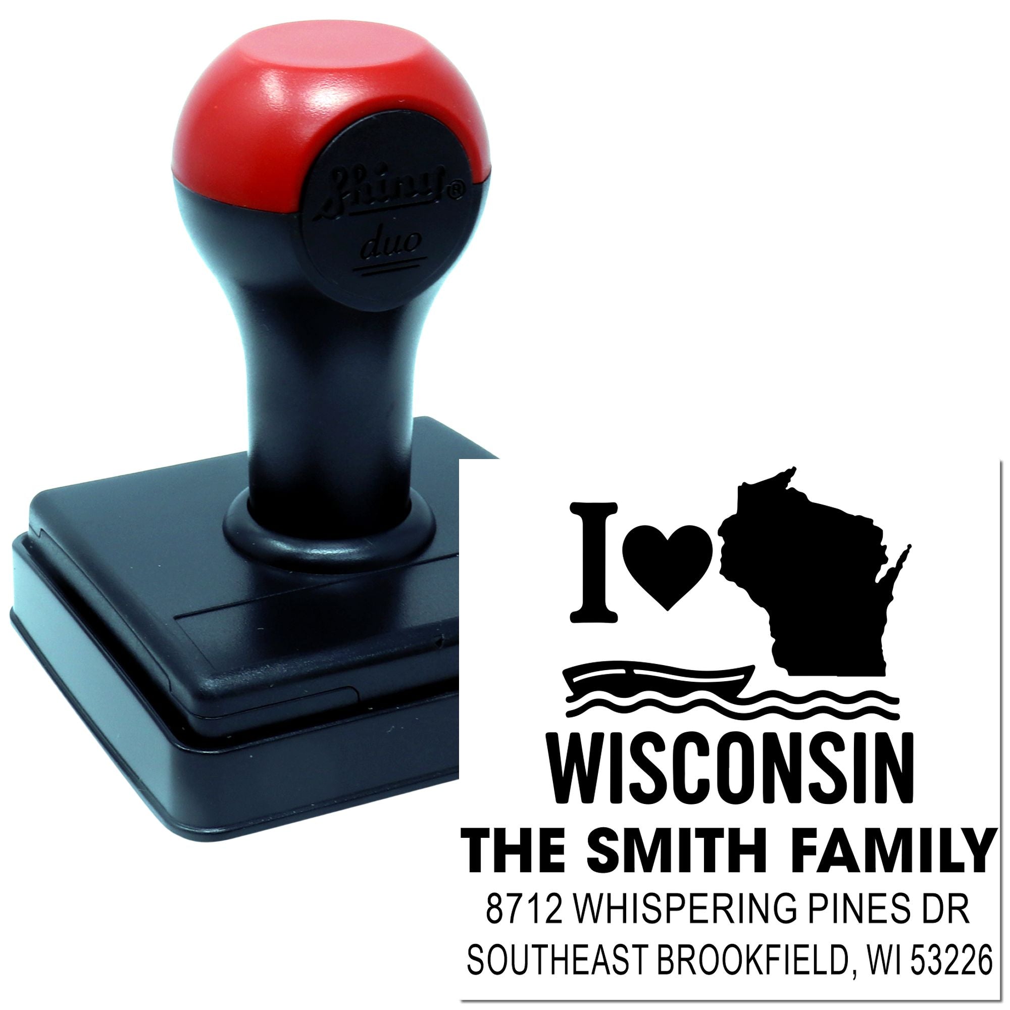 Custom self-inking address stamp with red-and-black handle, printing I Love Wisconsin, The Smith Family, and Brookfield, Wisconsin return address.