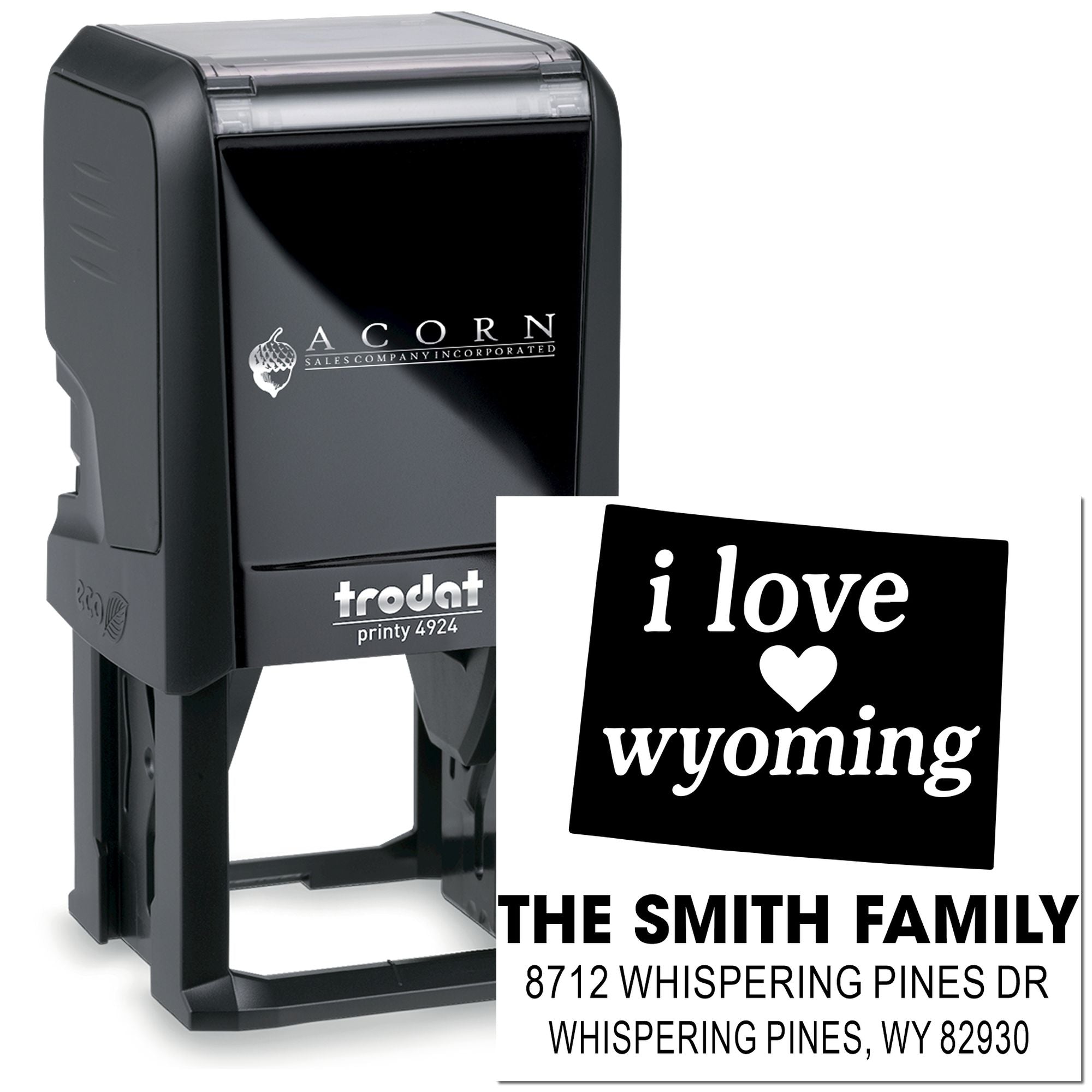 Custom self-inking Trodat Printy 4924 stamp and sample imprint with I love Wyoming family address on a white background.
