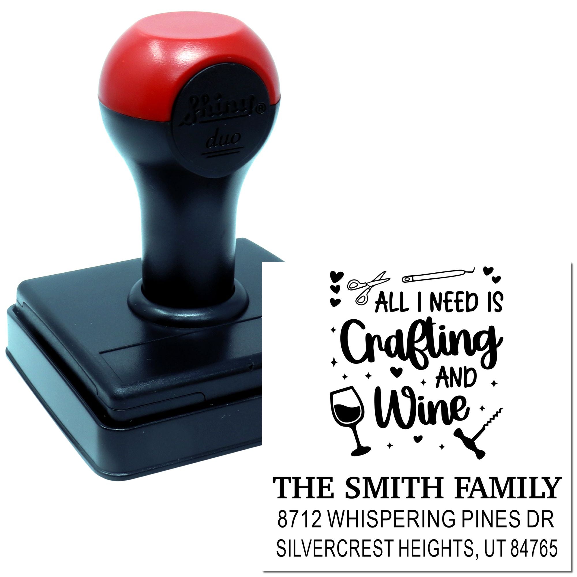Personalized self-inking craft stamp with All I Need Is Crafting and Wine design and family address on a white background.