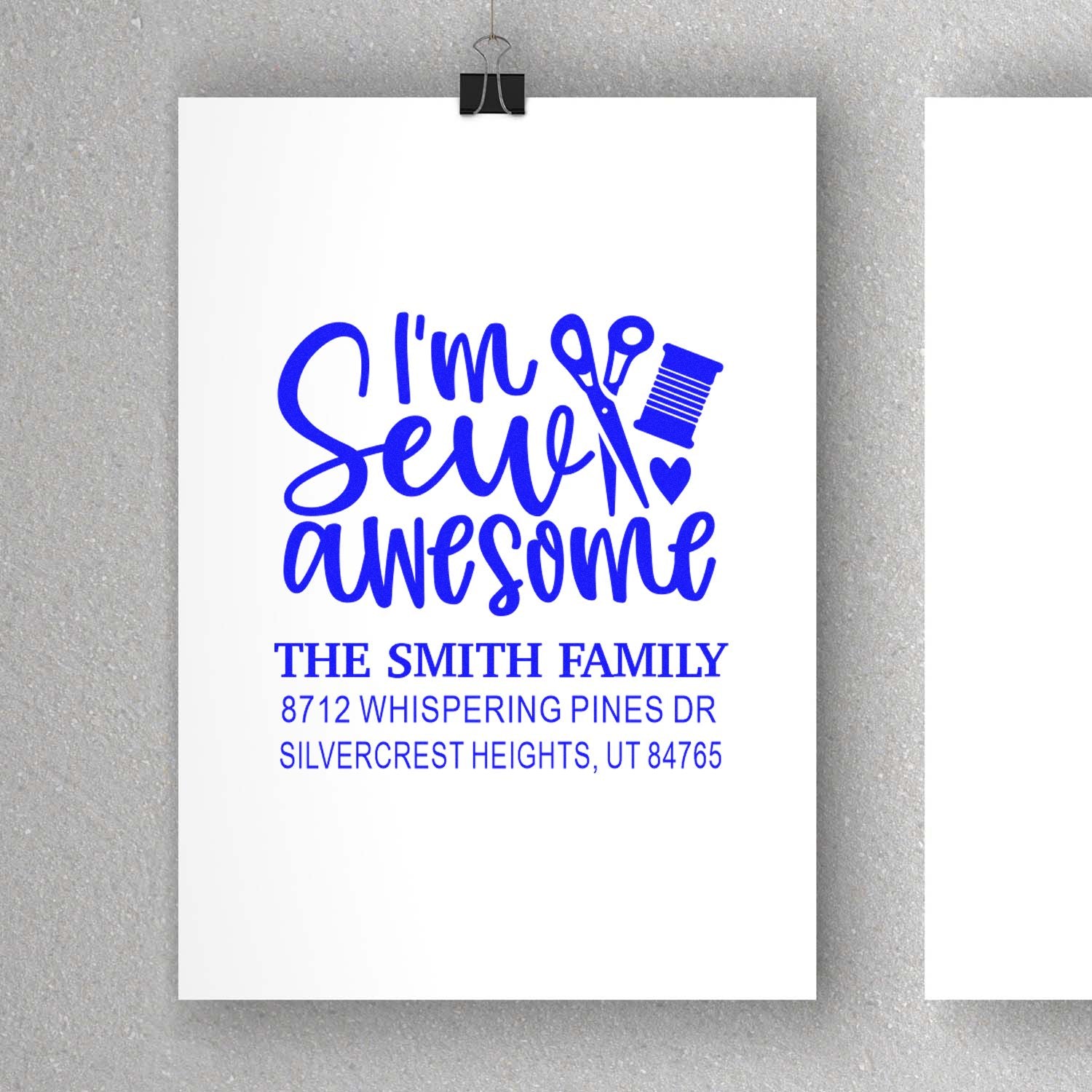 Personalized sewing-themed address stamp on white card, reading Im Sew Awesome with scissors, thread spool, heart, and Smith family address.