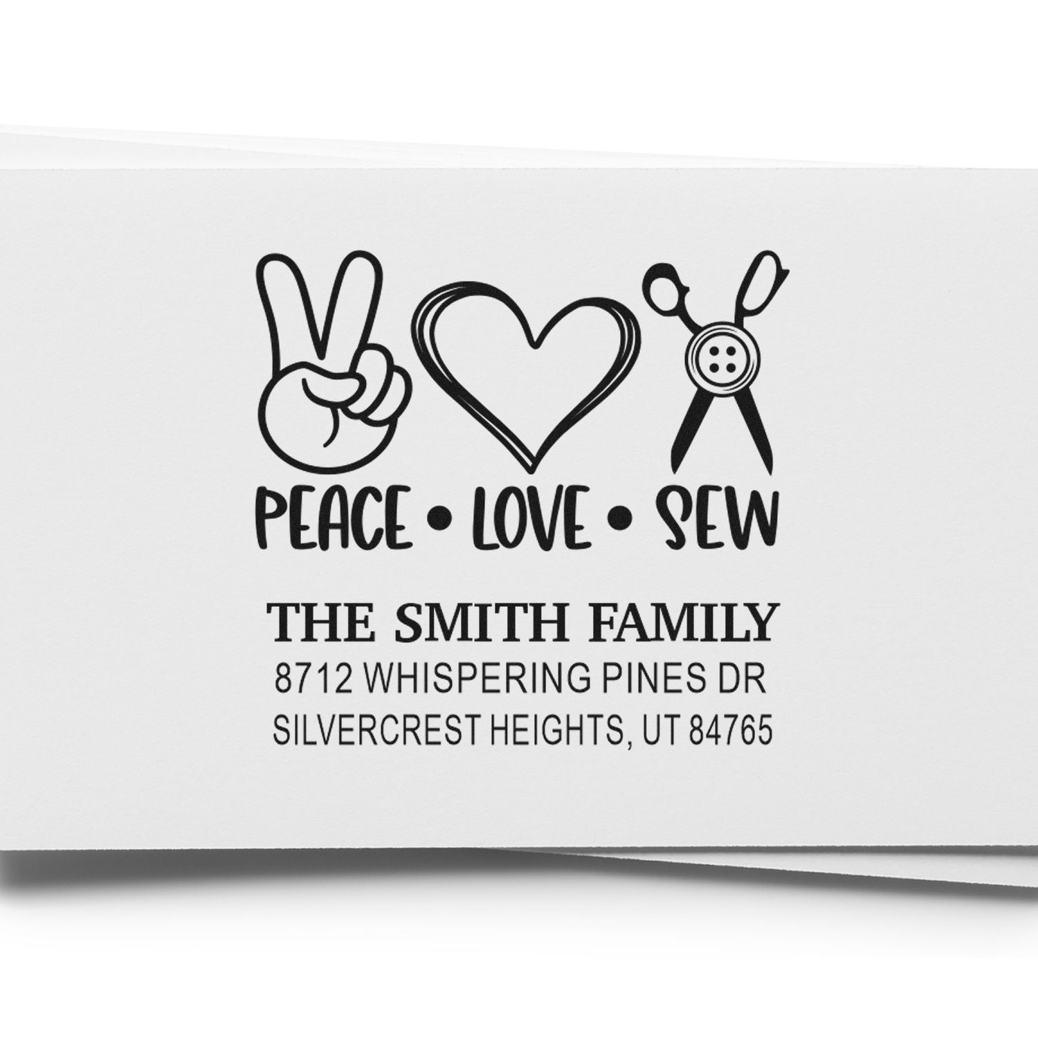 Personalized peace love sew address stamp with peace sign, heart and sewing scissors, featuring The Smith Family and Silvercrest Heights address.