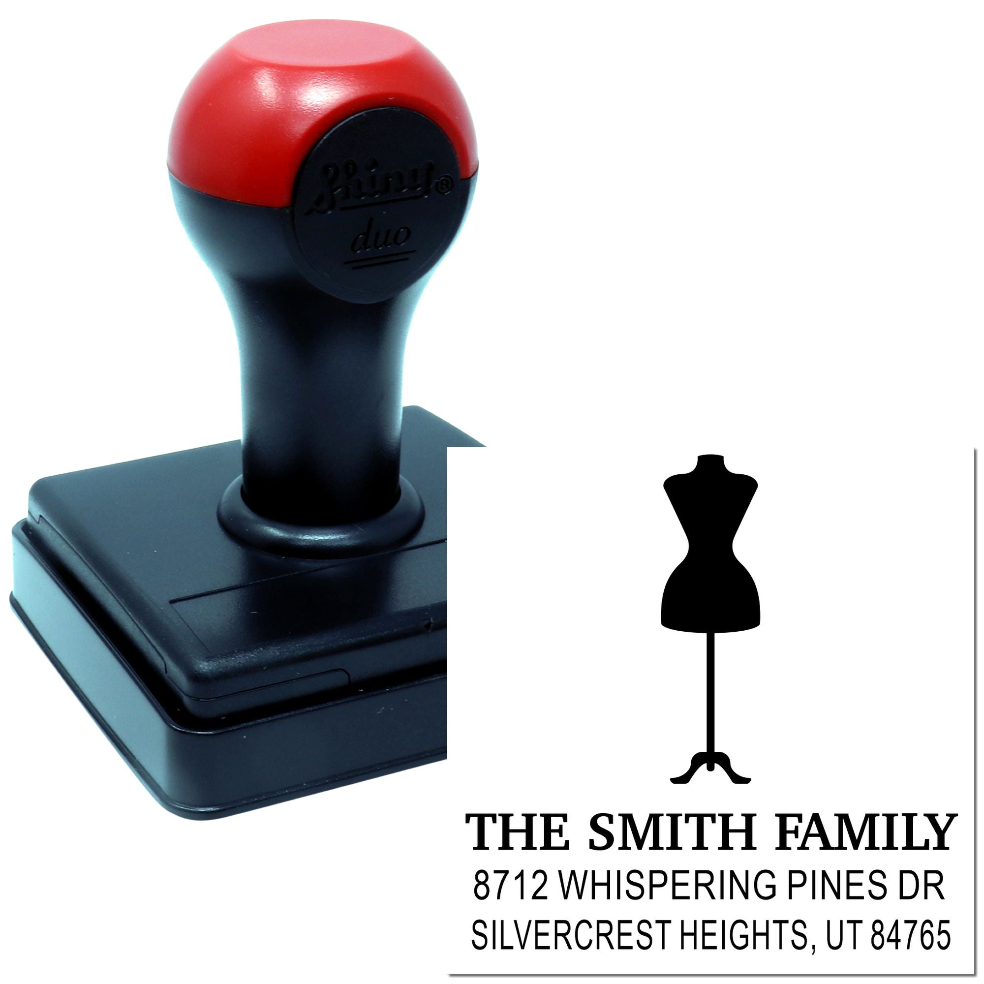 Custom self-inking address stamp with black base and red handle, displaying family name, return address and silhouette logo on white background.