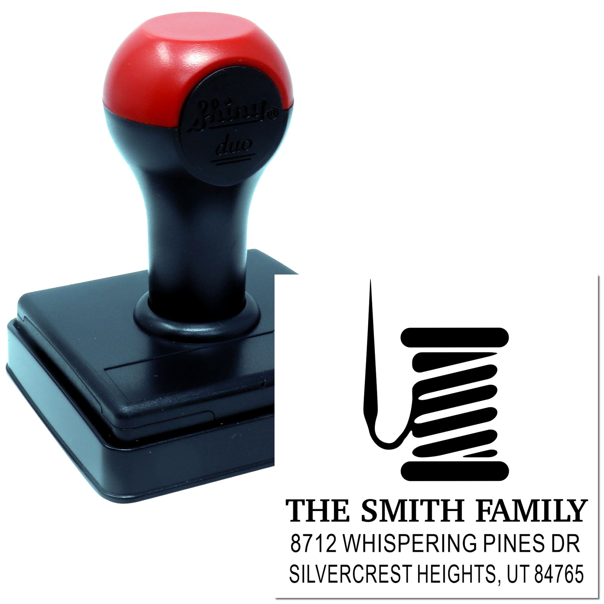 Custom self-inking address stamp with red and black handle, showing The Smith Family imprint and Whispering Pines Dr, Silvercrest Heights, UT 84765.