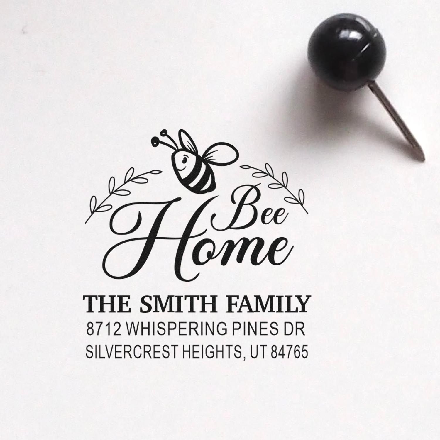 Bee-themed custom address stamp reading Bee Home with Smith Family name and Silvercrest Heights, UT return address on white paper.