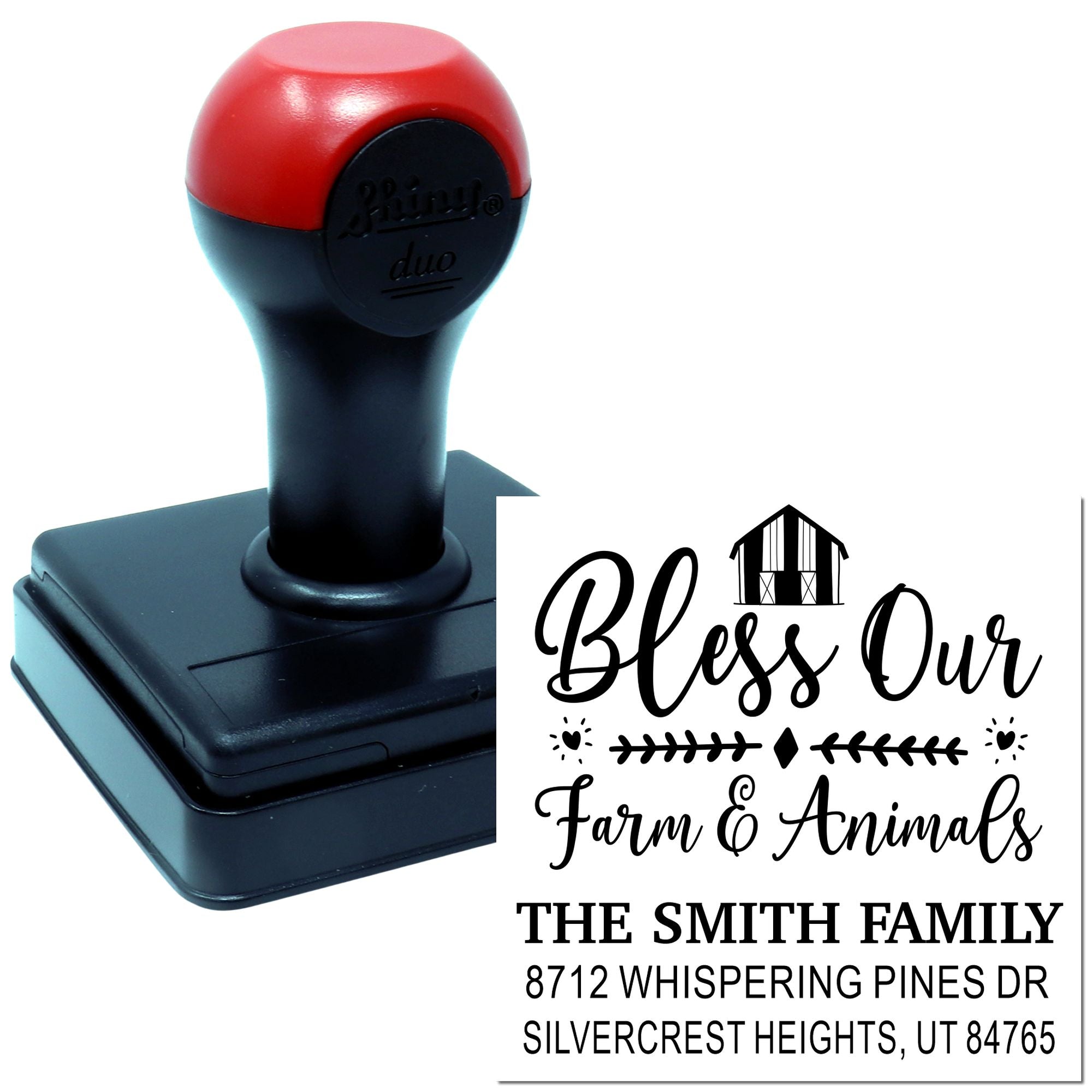 Custom self-inking farm stamp with red-and-black handle and sample imprint reading Bless Our Farm & Animals with family name and address on white background.