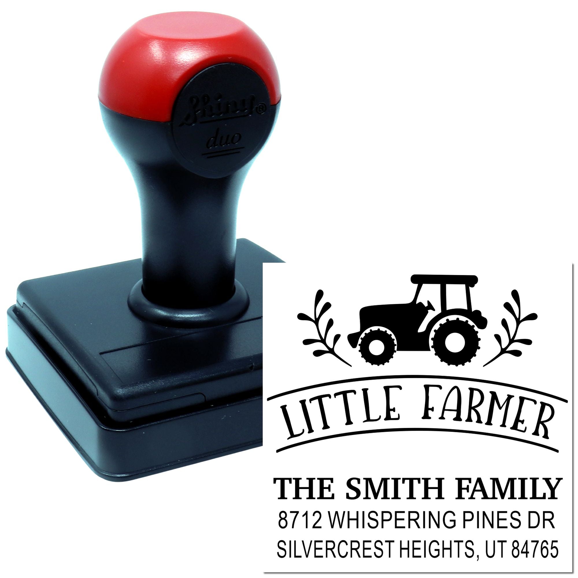 Custom self-inking farm address stamp with tractor and Little Farmer design, showing The Smith Family and Whispering Pines address on a white background.