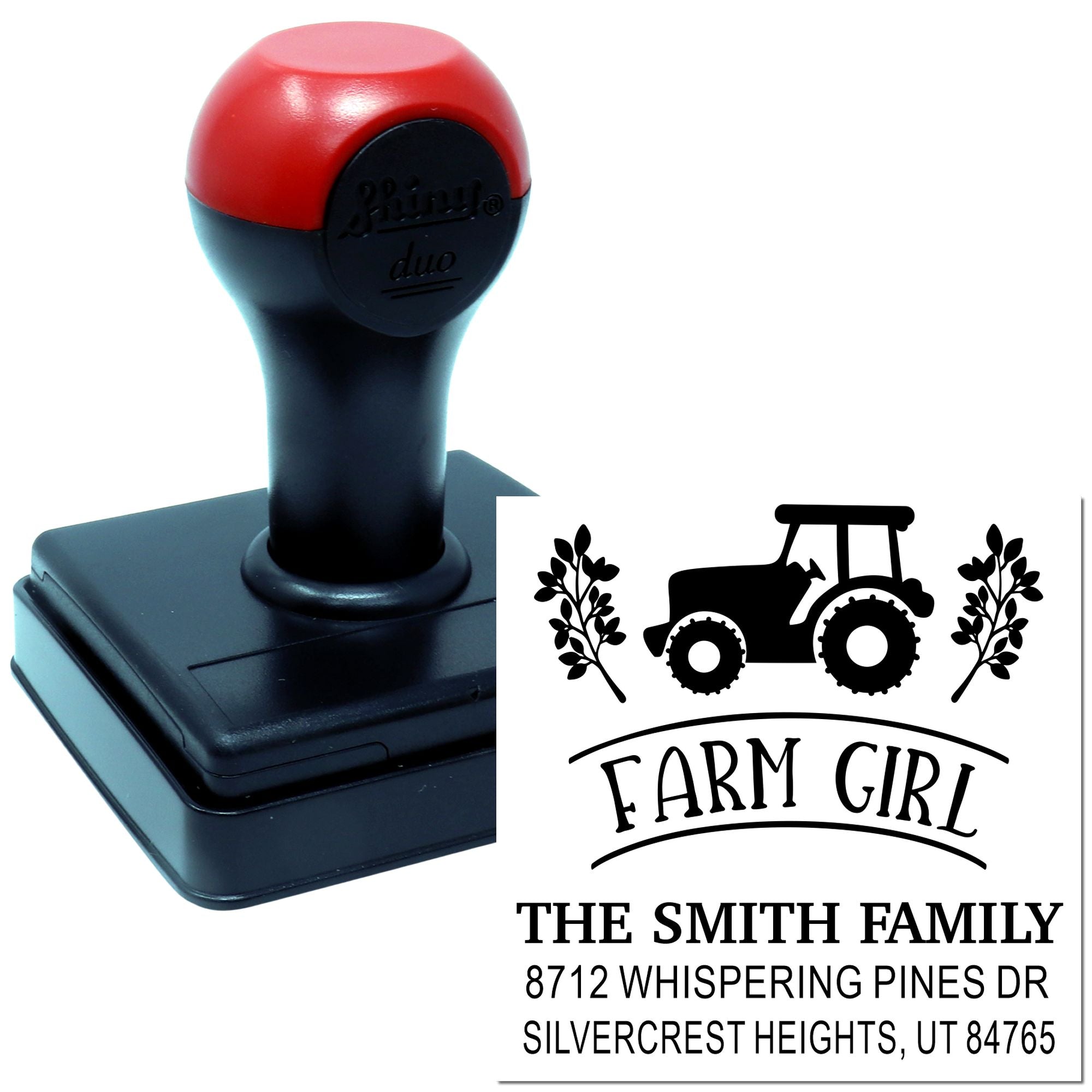 Custom self-inking farm girl address stamp with tractor design and family name, shown beside the stamp impression on a white background.