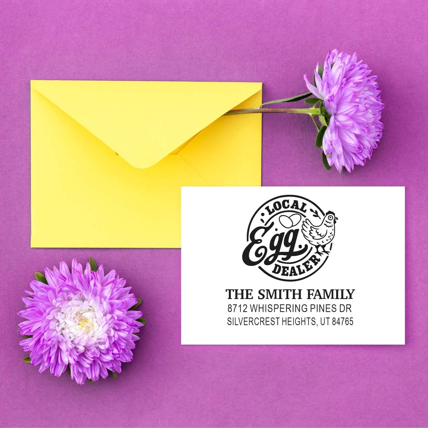 Custom return address stamp set for The Smith Family, styled with a yellow envelope and purple flowers on a purple background.