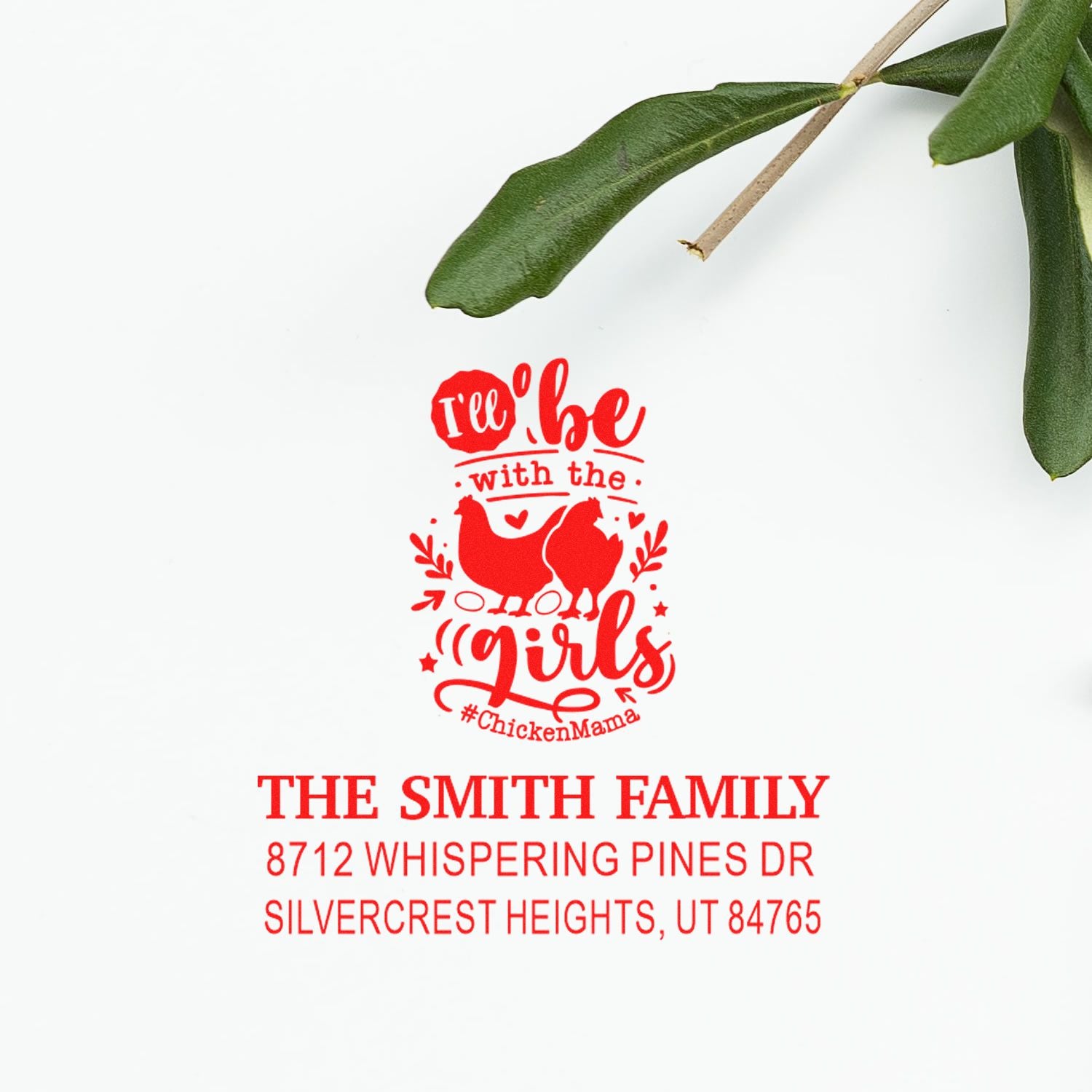 Red custom address stamp with Ill be with the girls chicken design, The Smith Family name and address on white paper with green leaves.