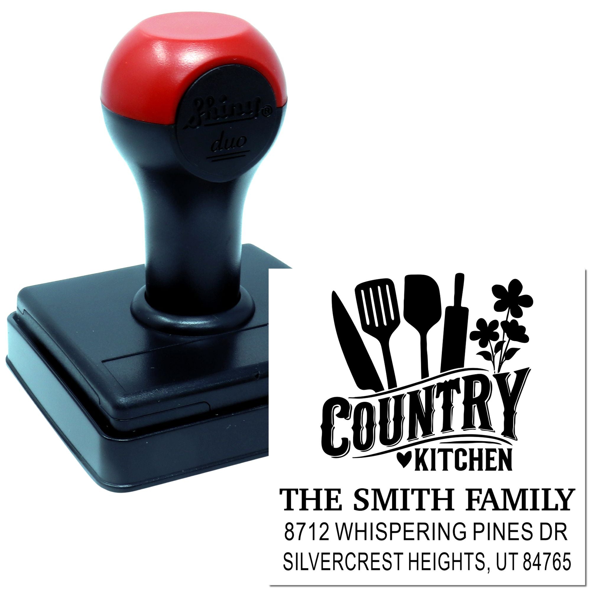 Custom self-inking country kitchen address stamp with red-black handle, utensils and flower motif, personalized with family name and address.