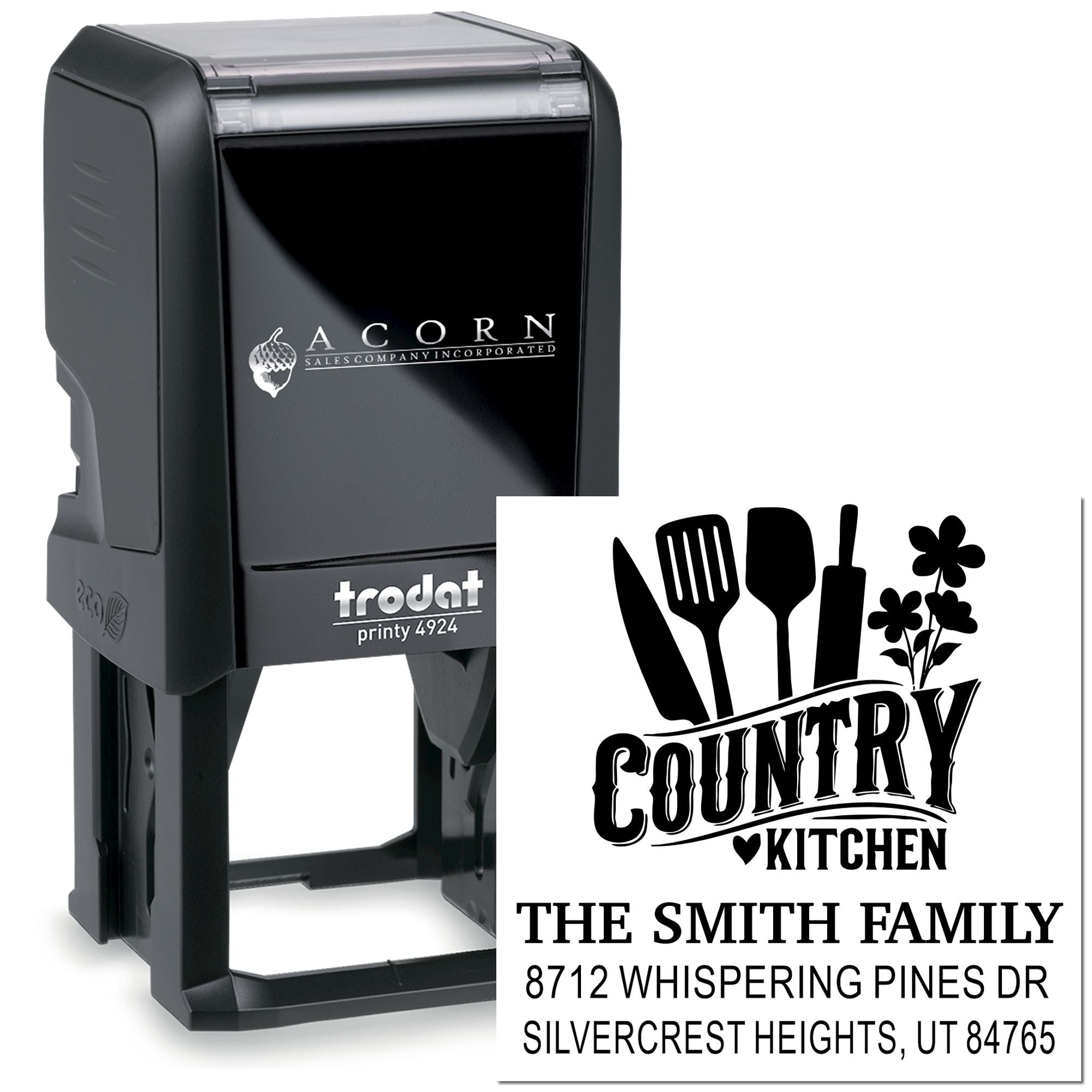 Custom self-inking Trodat stamp with Country Kitchen design, utensils, flowers, and The Smith Family address on a white background.