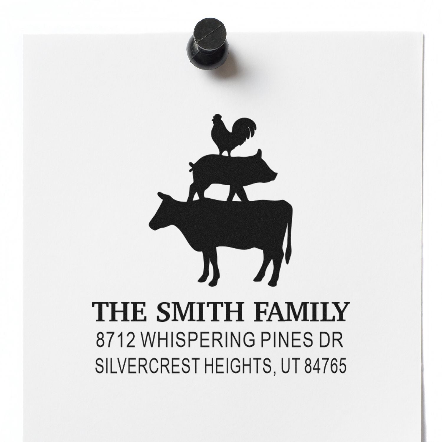 Custom address stamp with stacked pig, cow, and rooster silhouette on white paper, reading The Smith Family, Silvercrest Heights, UT 84765.