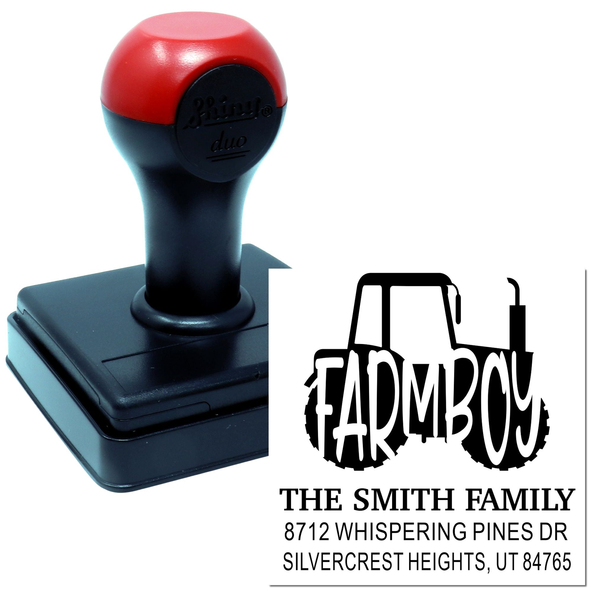 Custom self-inking return address stamp with red-and-black handle, farm tractor design, and The Smith Family address on a white background.