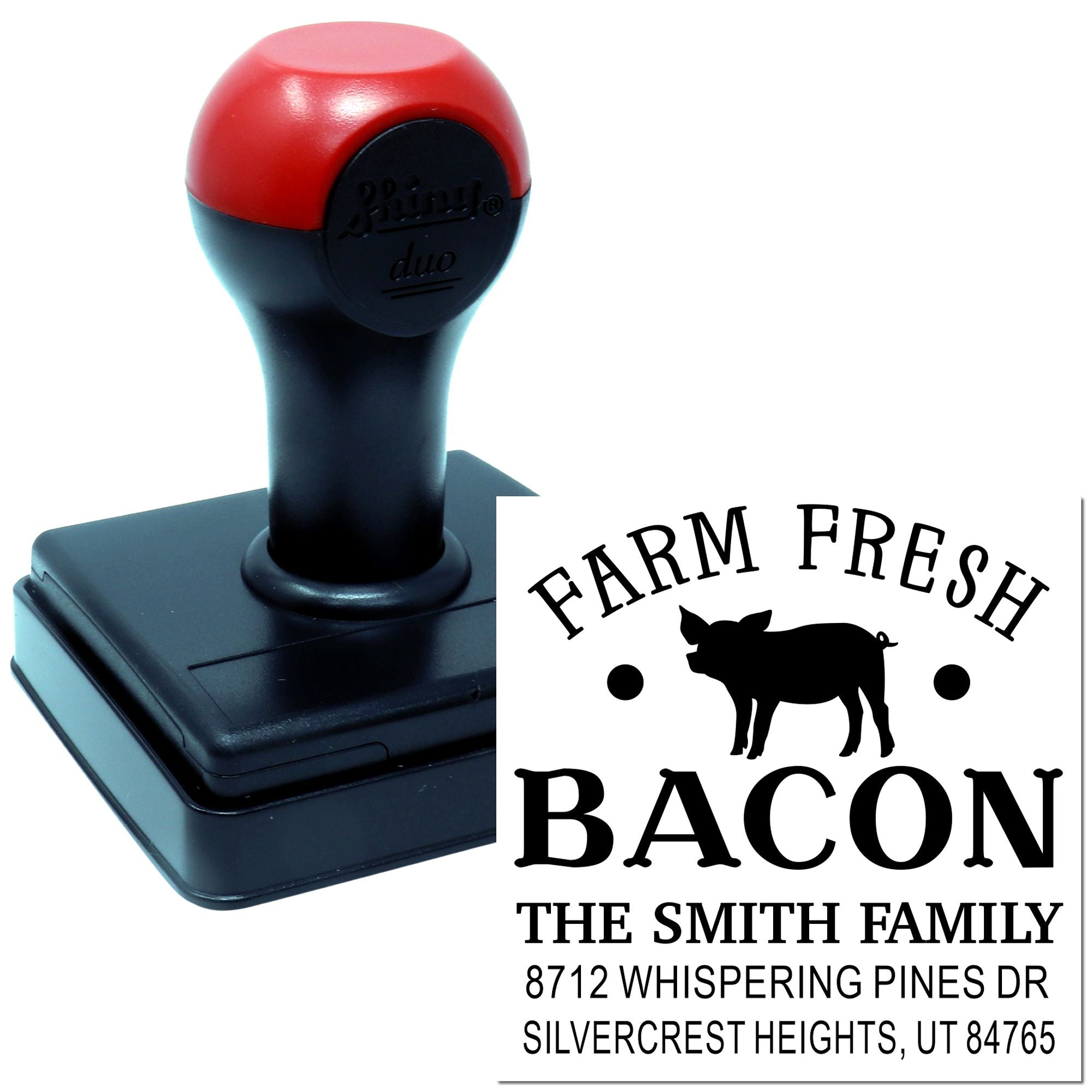 Custom self-inking stamp on white background, showing a Farm Fresh Bacon pig design and Smith family address for personalized mailing.