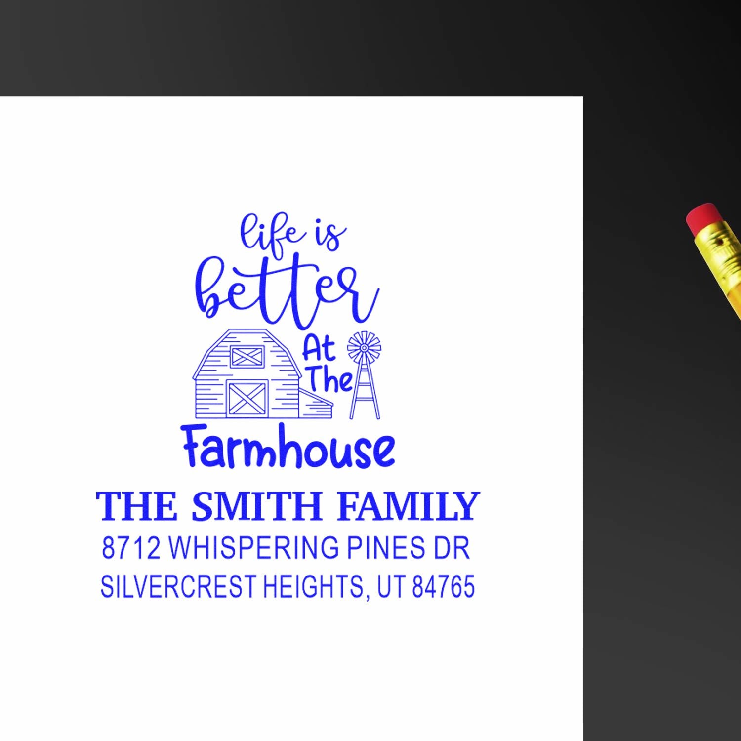 Custom farmhouse address stamp with barn and windmill, reading Life is better at the Farmhouse for The Smith Family in blue ink on white.