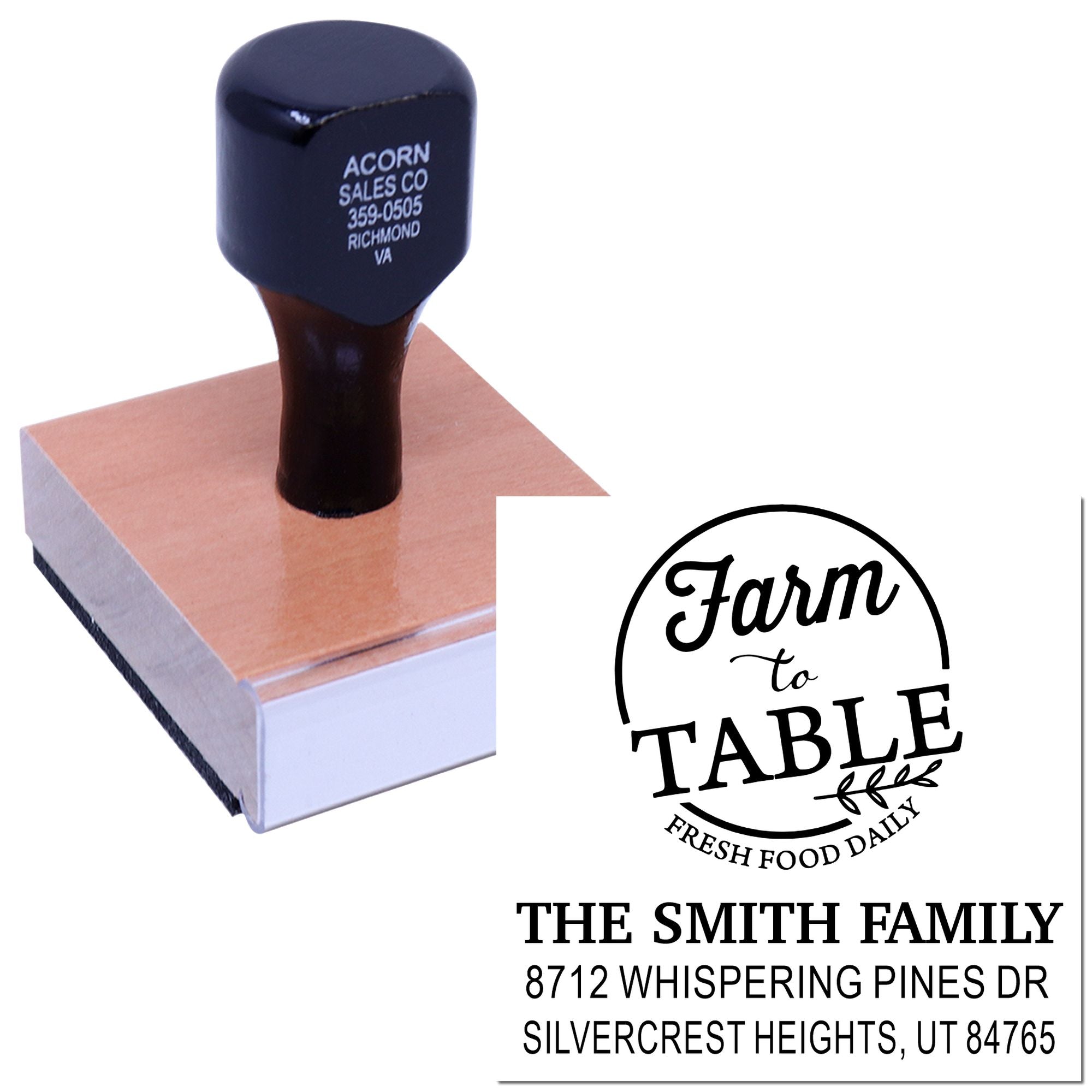 Custom self-inking stamp on wooden block with Farm to Table logo and family address imprint on a white background.