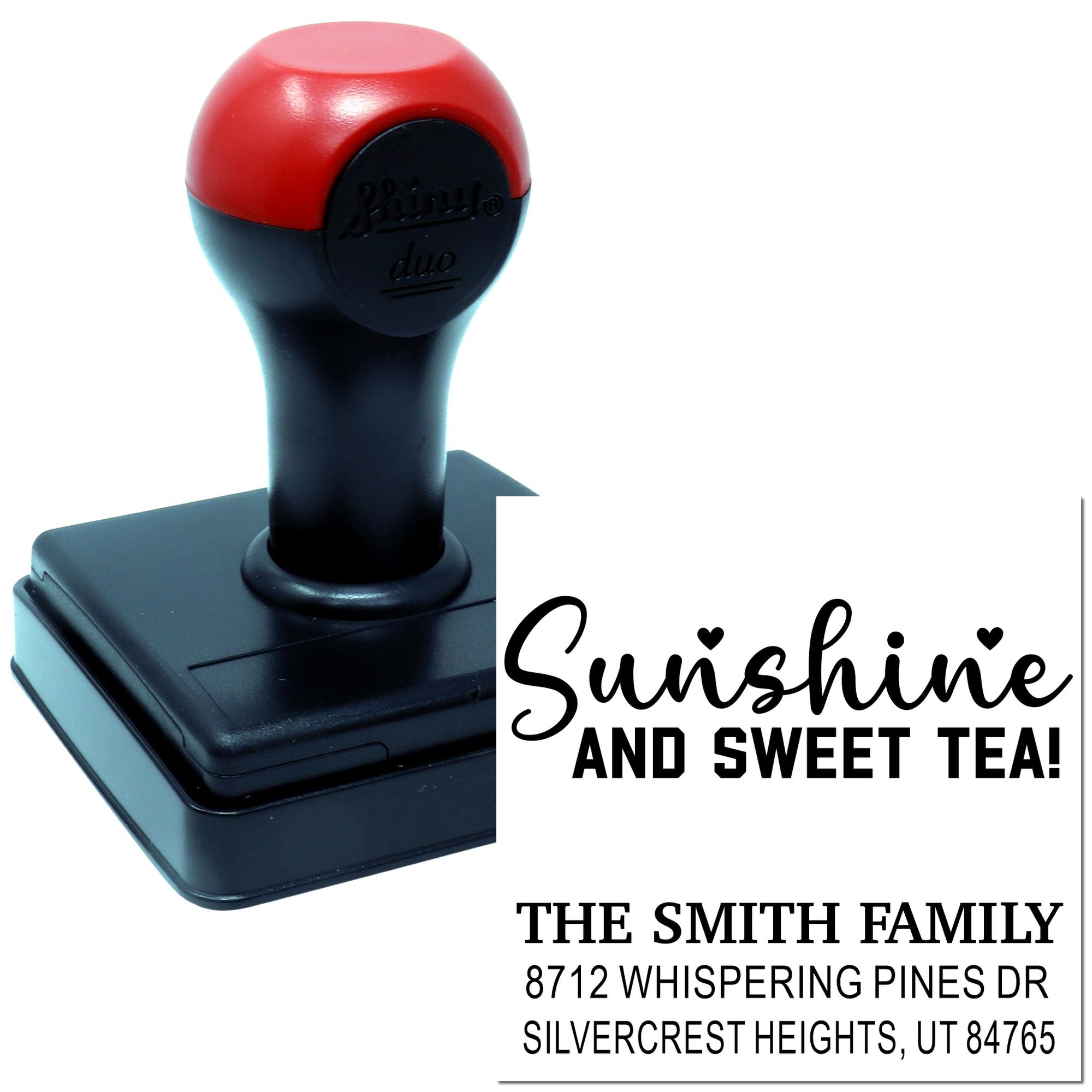 Red-and-black self-inking address stamp showing Sunshine and Sweet Tea with personalized family name and Utah return address on white background.