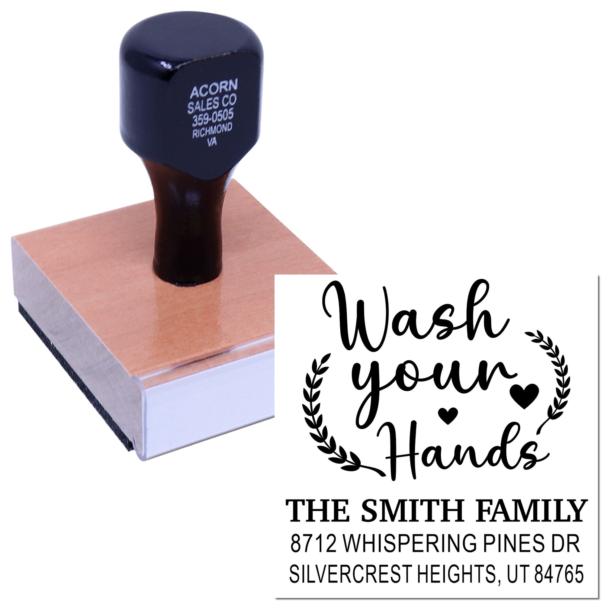 Custom self-inking address stamp on a white background, pressed on a block, with Wash your Hands design, family name, and address.