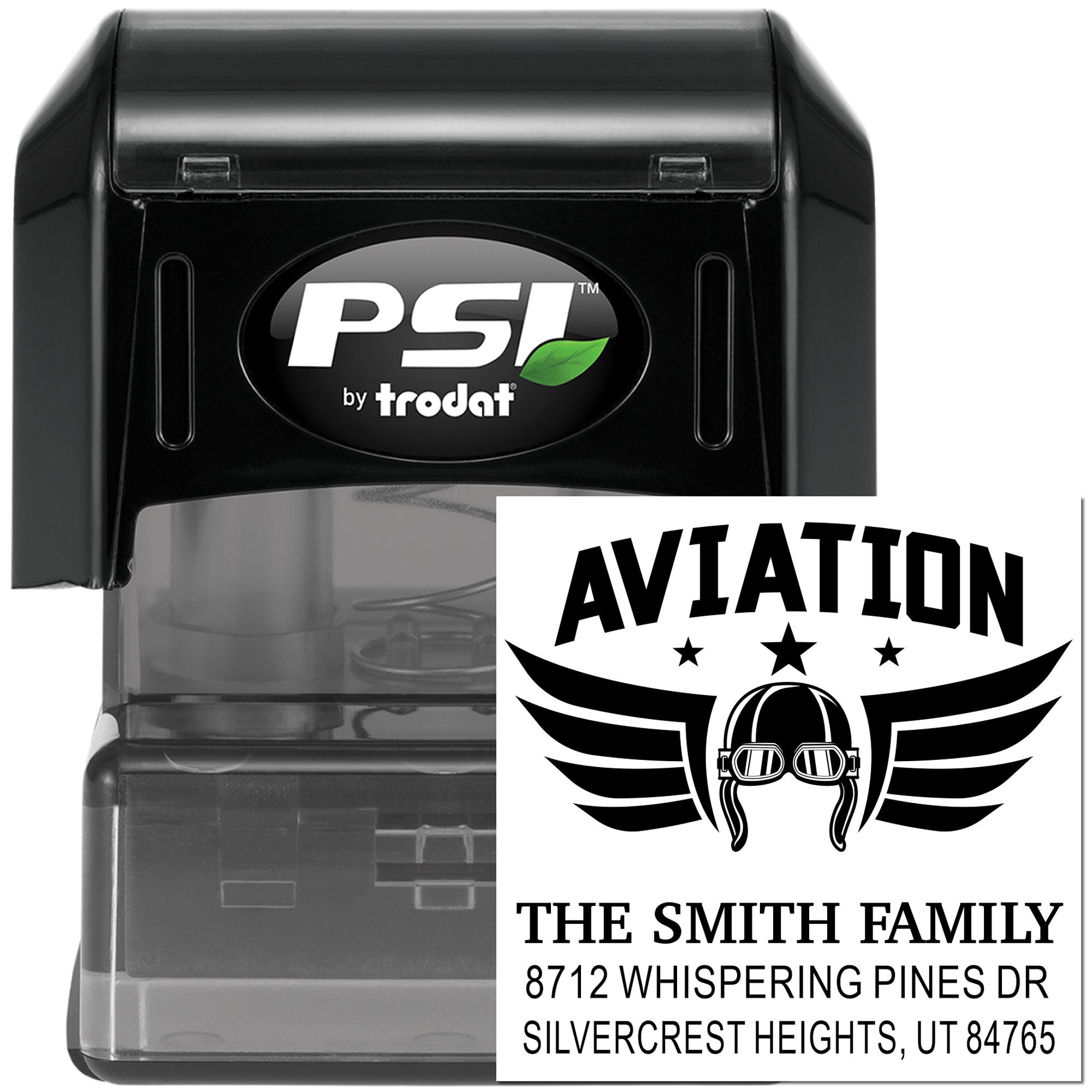Black PSI by Trodat self-inking address stamp with custom aviation logo, family name, and home address imprint on white background