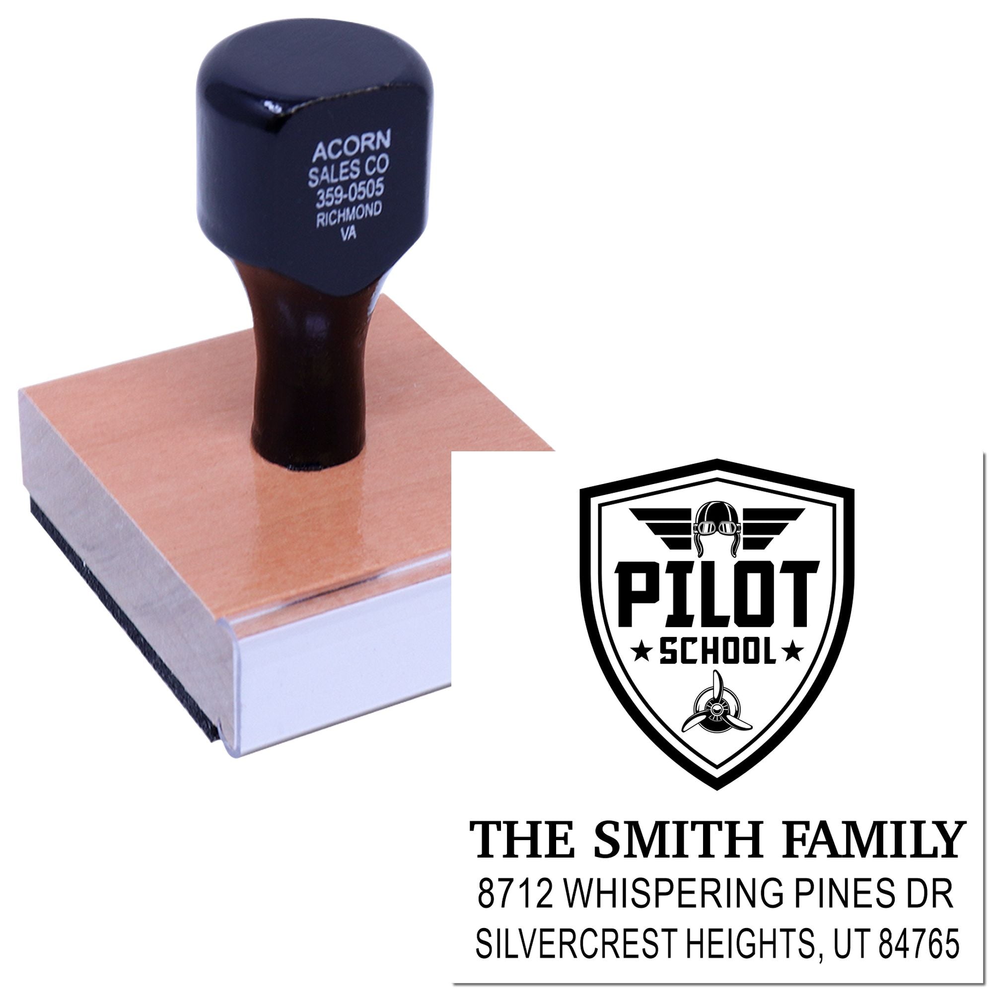 Custom return address stamp on ink pad, featuring Pilot School logo and The Smith Family address for personalized mailing.