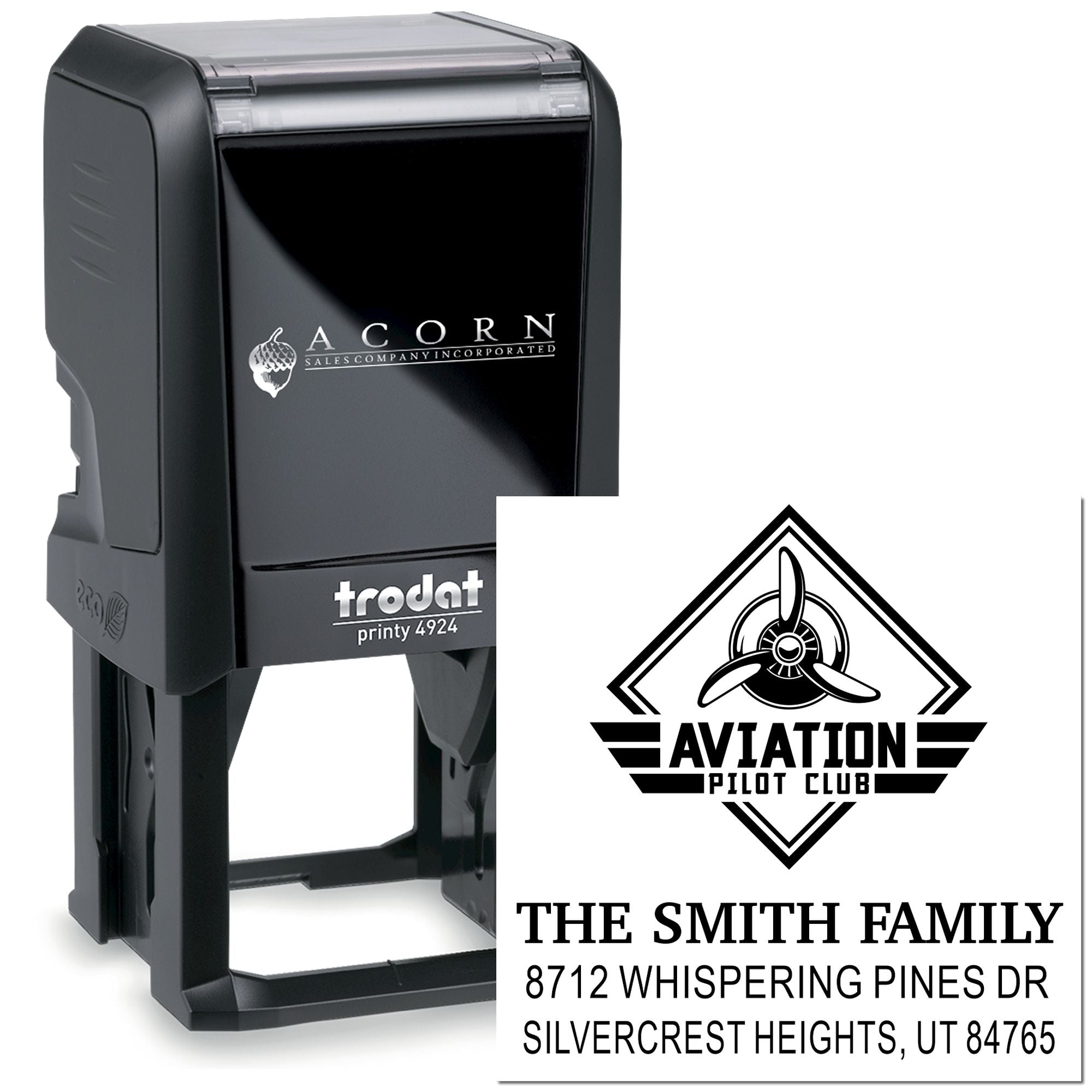 Custom self-inking stamp with Aviation Pilot Club logo and The Smith Family address, shown beside a black Trodat stamp on white background.