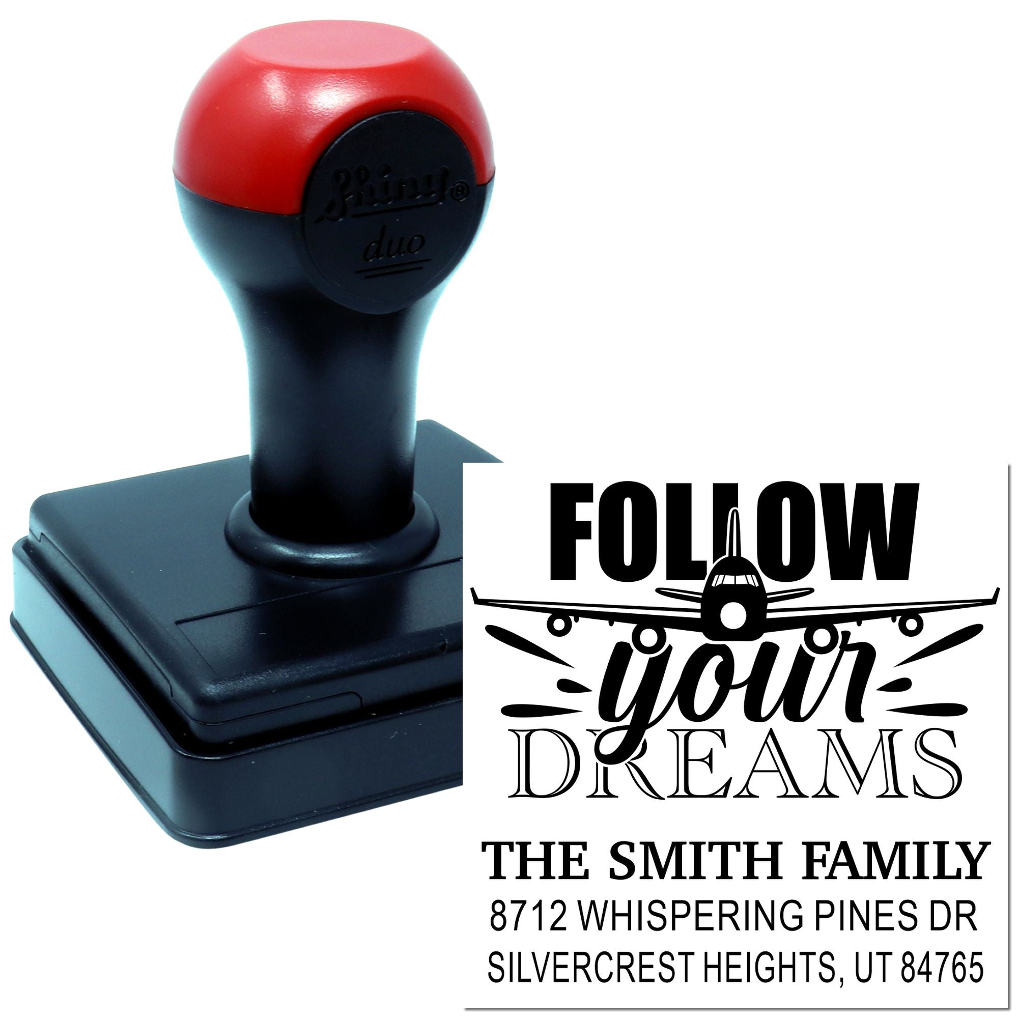 Custom self-inking rubber stamp with airplane Follow your dreams design and Smith family return address on a white background.