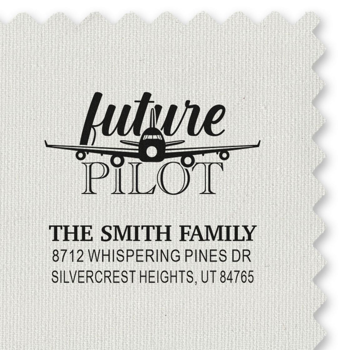 Personalized return address stamp with airplane and future pilot design for The Smith Family on textured paper, showing address details.