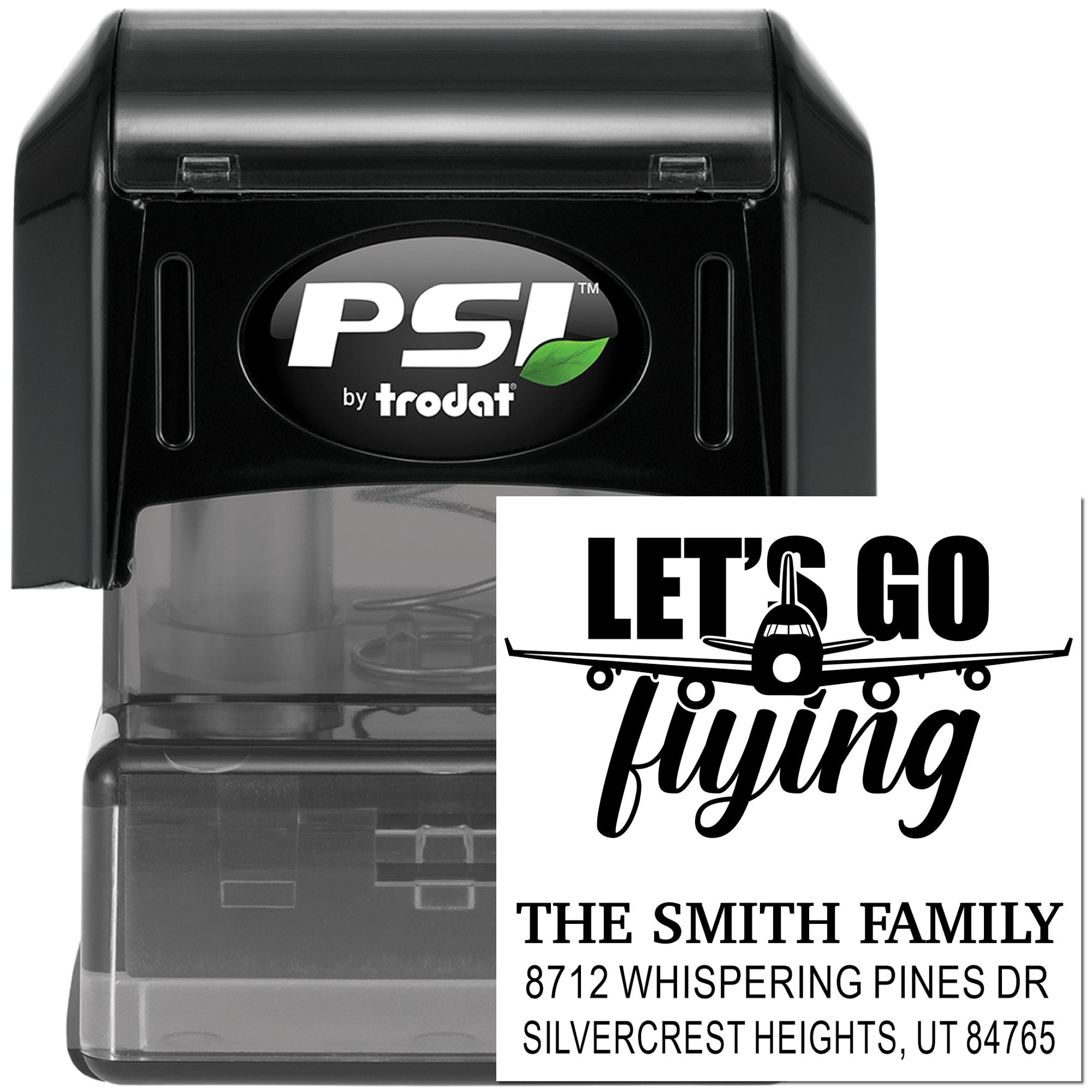 PSI by Trodat self-inking stamp featuring Lets Go Flying airplane design and Smith family address on black stamp case.