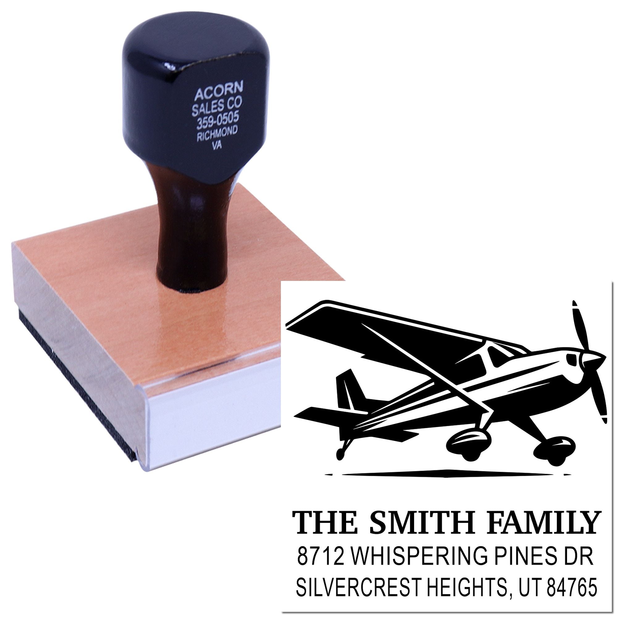 Custom rubber stamp with airplane graphic and Smith family address, shown on a white background with the stamp head and imprint design.