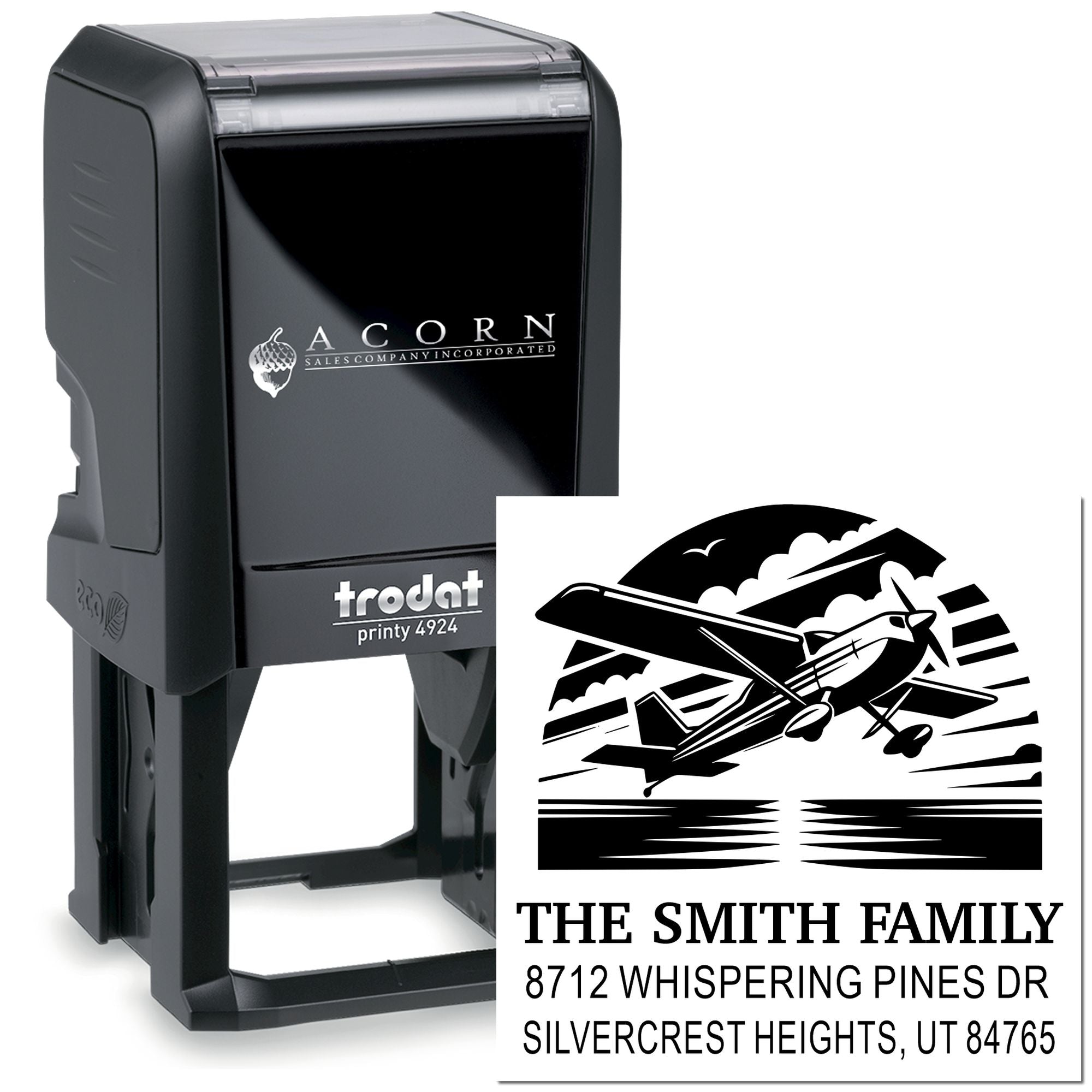 Custom self-inking Trodat address stamp with airplane graphic, featuring The Smith Family name and Silvercrest Heights, UT address on a white background.