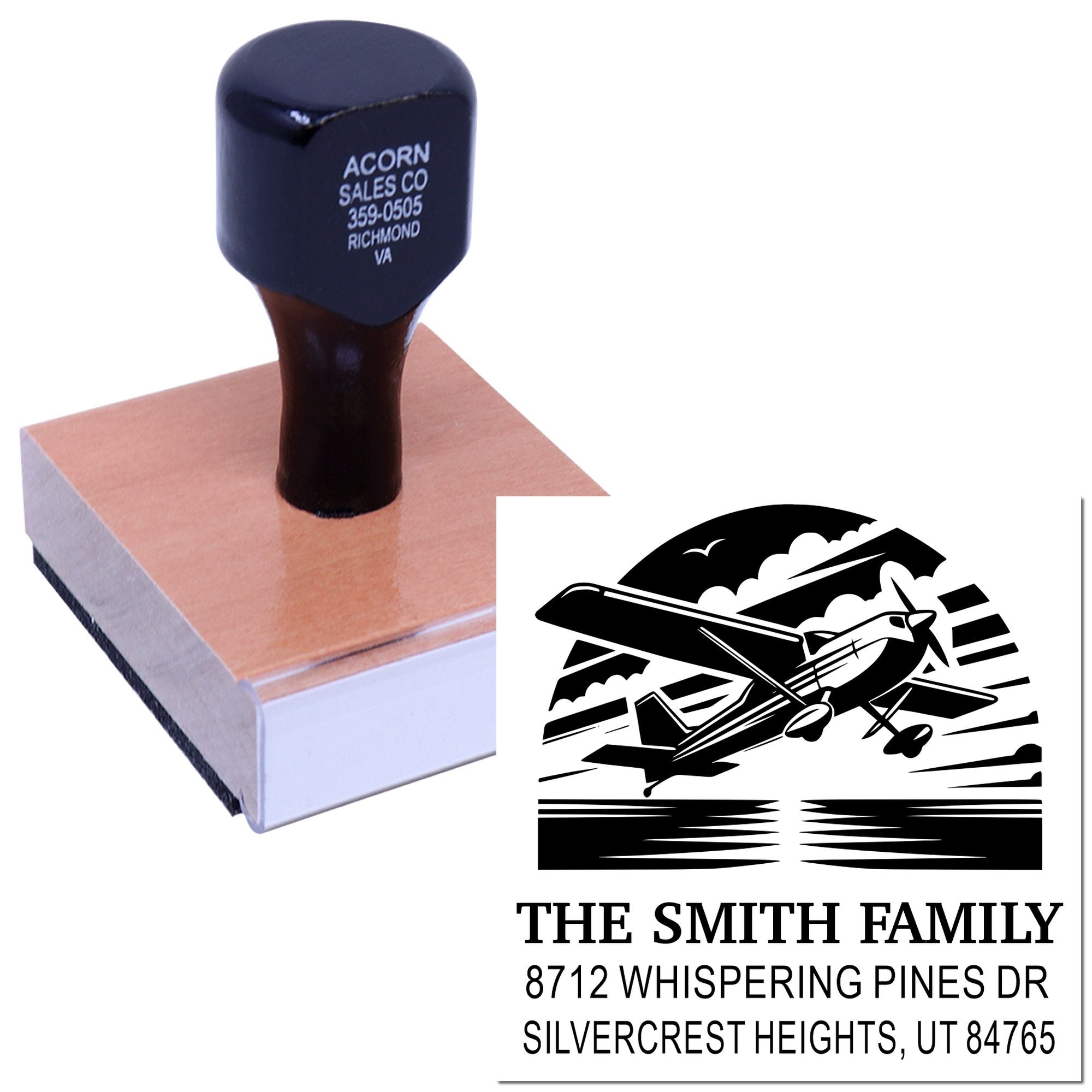 Custom self-inking address stamp with airplane graphic, showing The Smith Family return address on a white background.