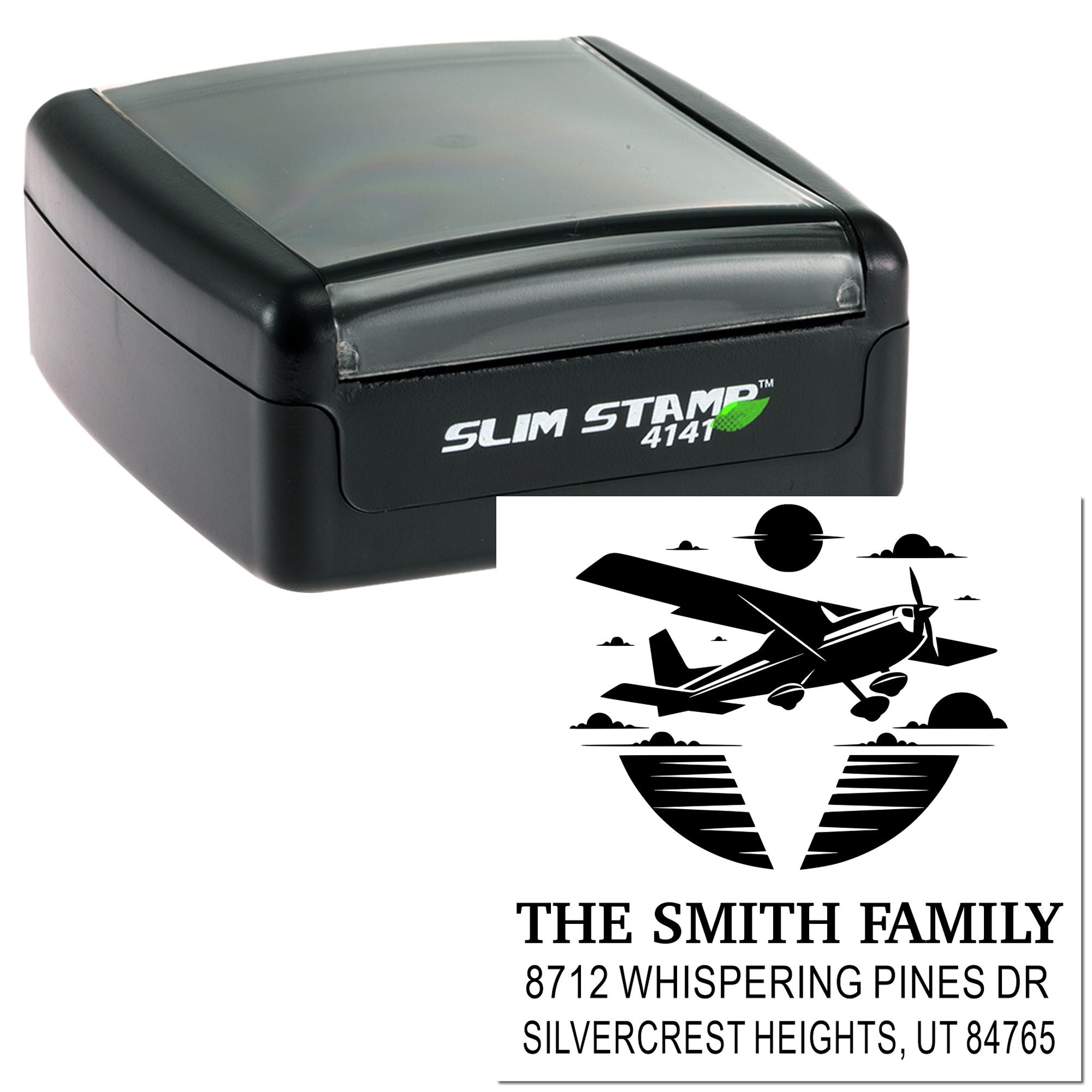 Custom self-inking stamp with airplane design and The Smith Family return address, shown beside the stamped impression.