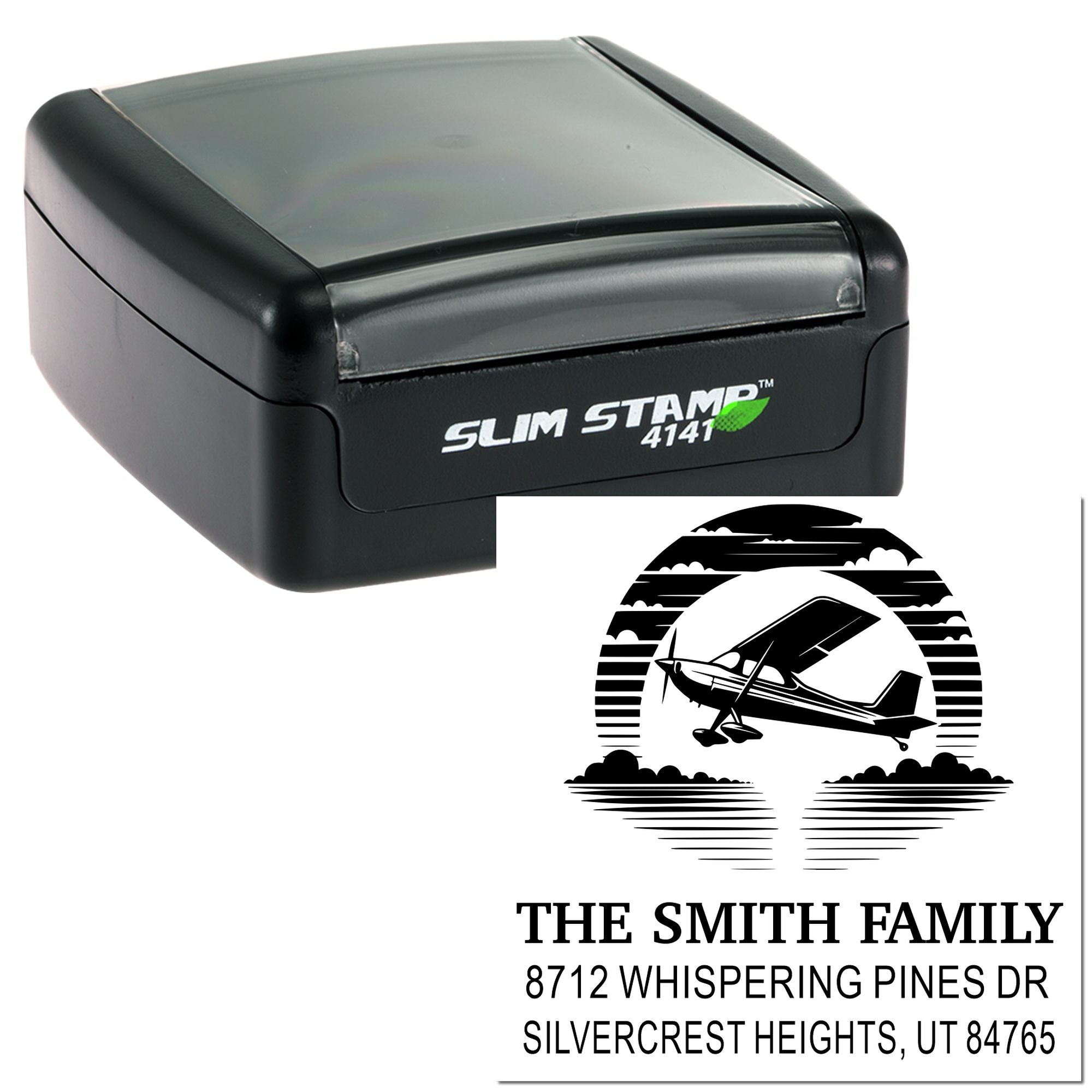 Slim Stamp 4141 self-inking address stamp with airplane logo, showing custom family return address imprint on white background.
