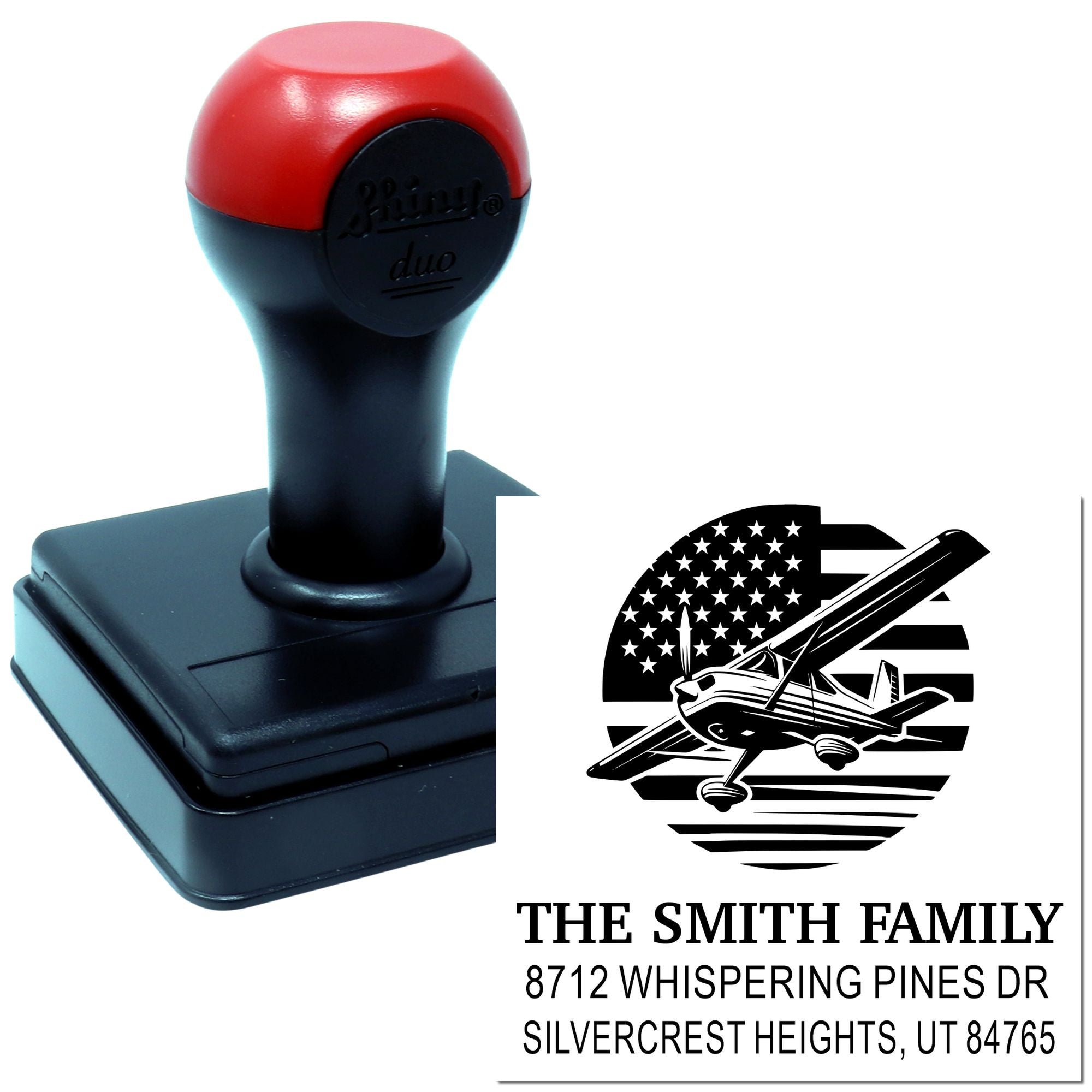 Custom self-inking address stamp with airplane and U.S. flag design, featuring The Smith Family name and Whispering Pines Dr, Silvercrest Heights, UT.