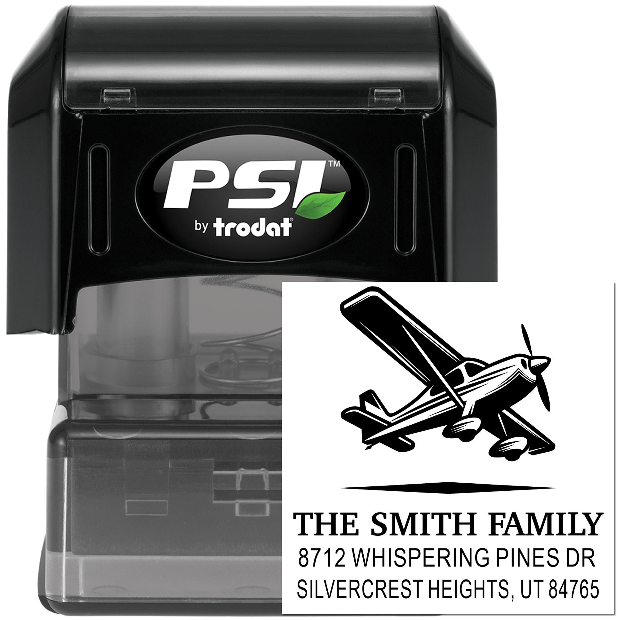 PSI by Trodat self-inking custom address stamp with airplane logo and The Smith Family mailing imprint on a clear black stamp case.