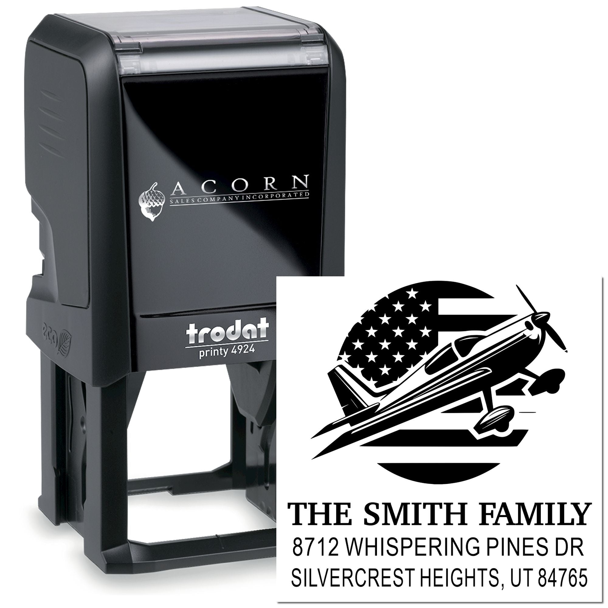 Custom self-inking Trodat stamp on white background with airplane family return address design for The Smith Family and Silvercrest Heights address.