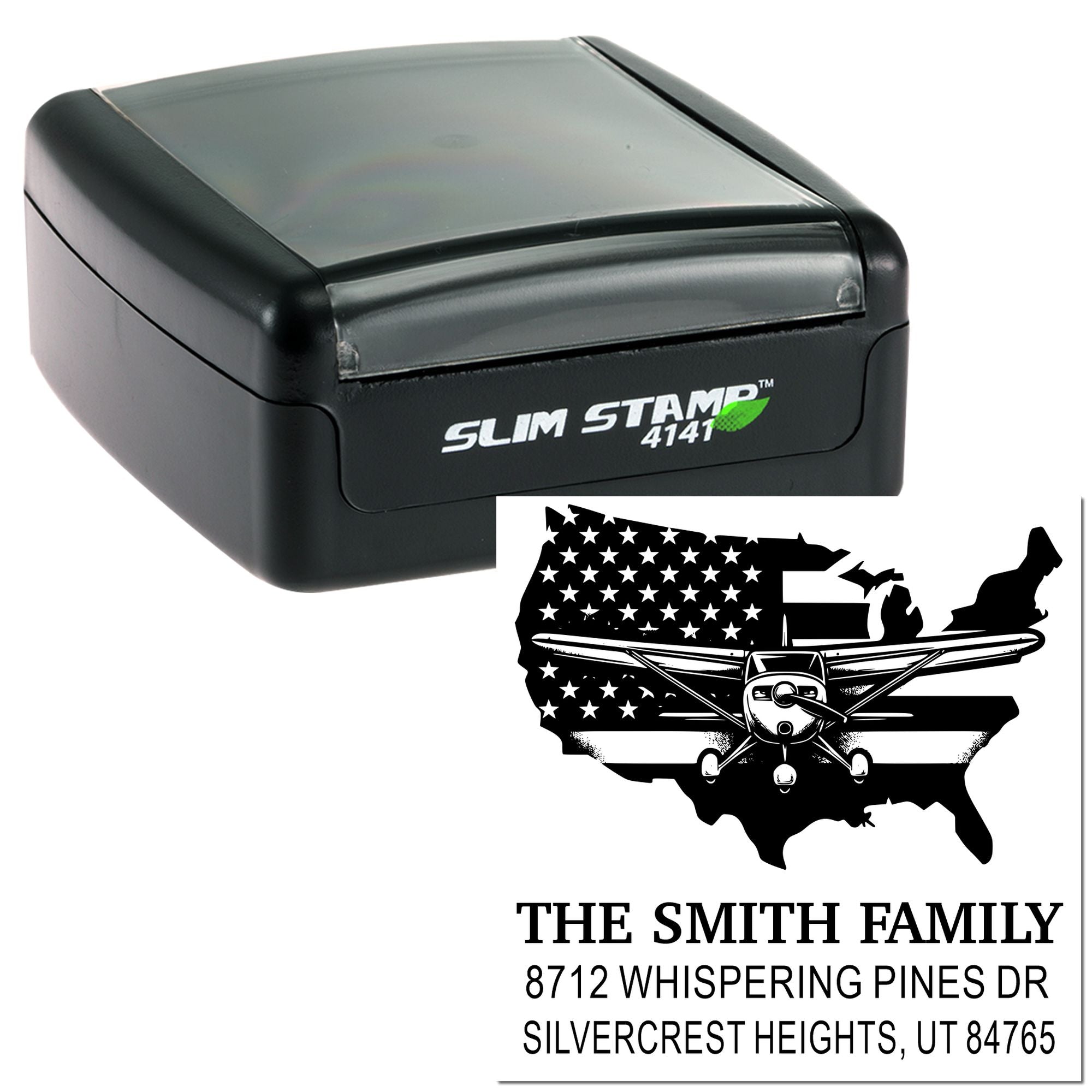Slim Stamp self-inking address stamp with U.S. flag, airplane and map design, showing custom family name and address on a white background.