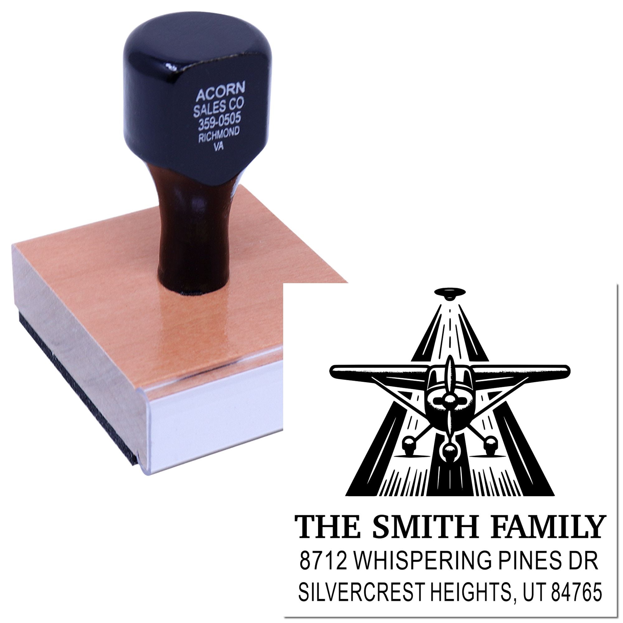 Self-inking custom address stamp with airplane logo, featuring The Smith Family and Utah address on a white background.