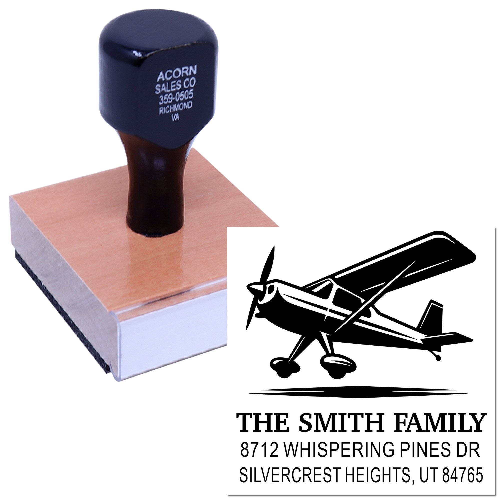 Custom self-inking address stamp with airplane design, displaying The Smith Family and Silvercrest Heights, UT address on a white background.