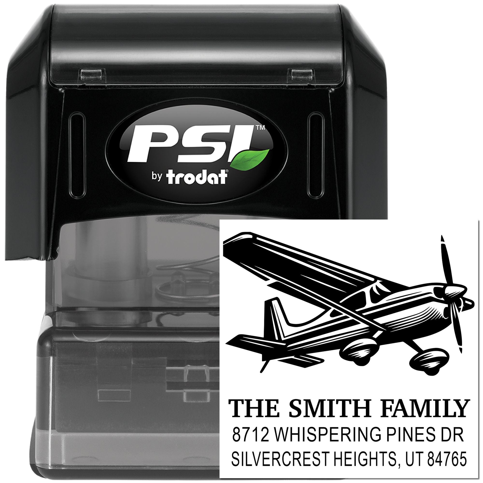 PSI by Trodat self-inking custom address stamp with airplane design, shown on a white background for mailing and family branding.
