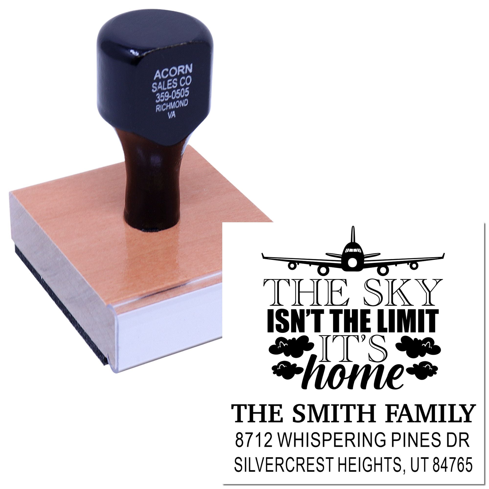 Custom airplane return address stamp shown on a block, printing The sky isnt the limit, its home for The Smith Family.